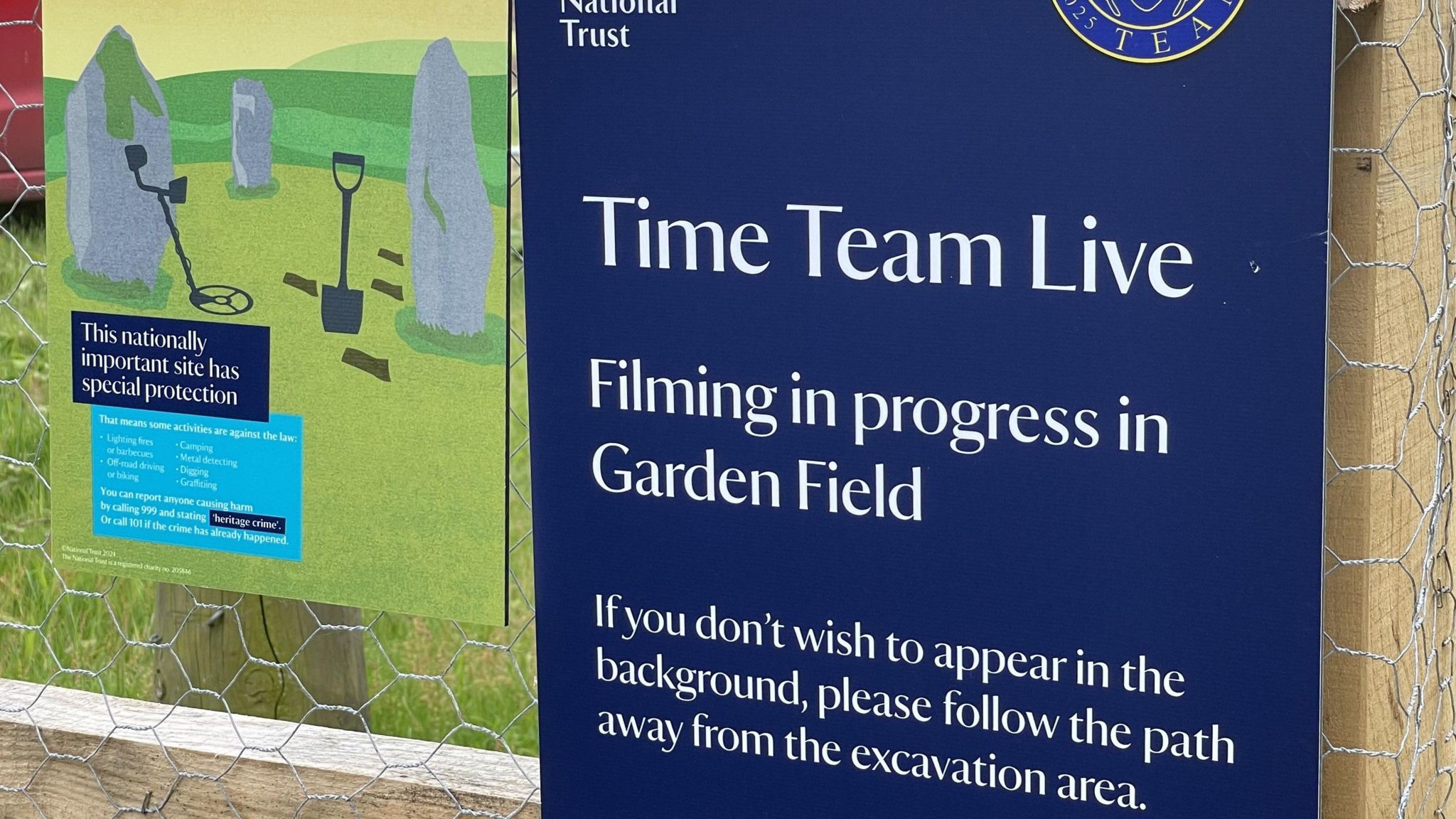 A sign informing Sutton Hoo visitors of the filming taking place during the project