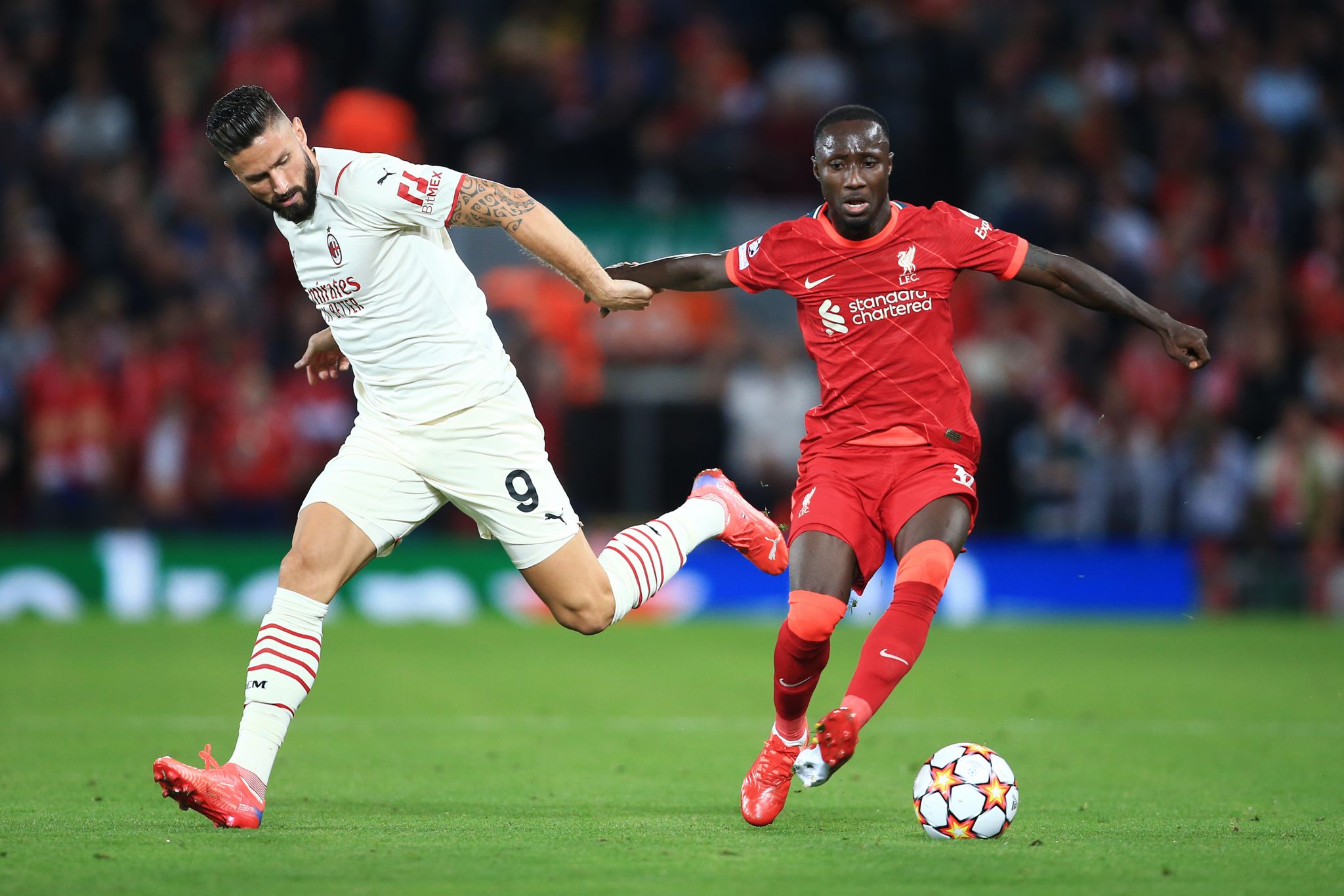 Olivier Giroud & Naby Keita in the last match between Liverpool and AC Milan at Anfield