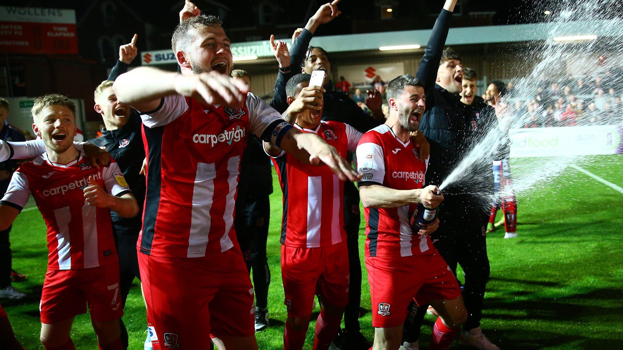 Exeter City victory parade to celebrate promotion - BBC News