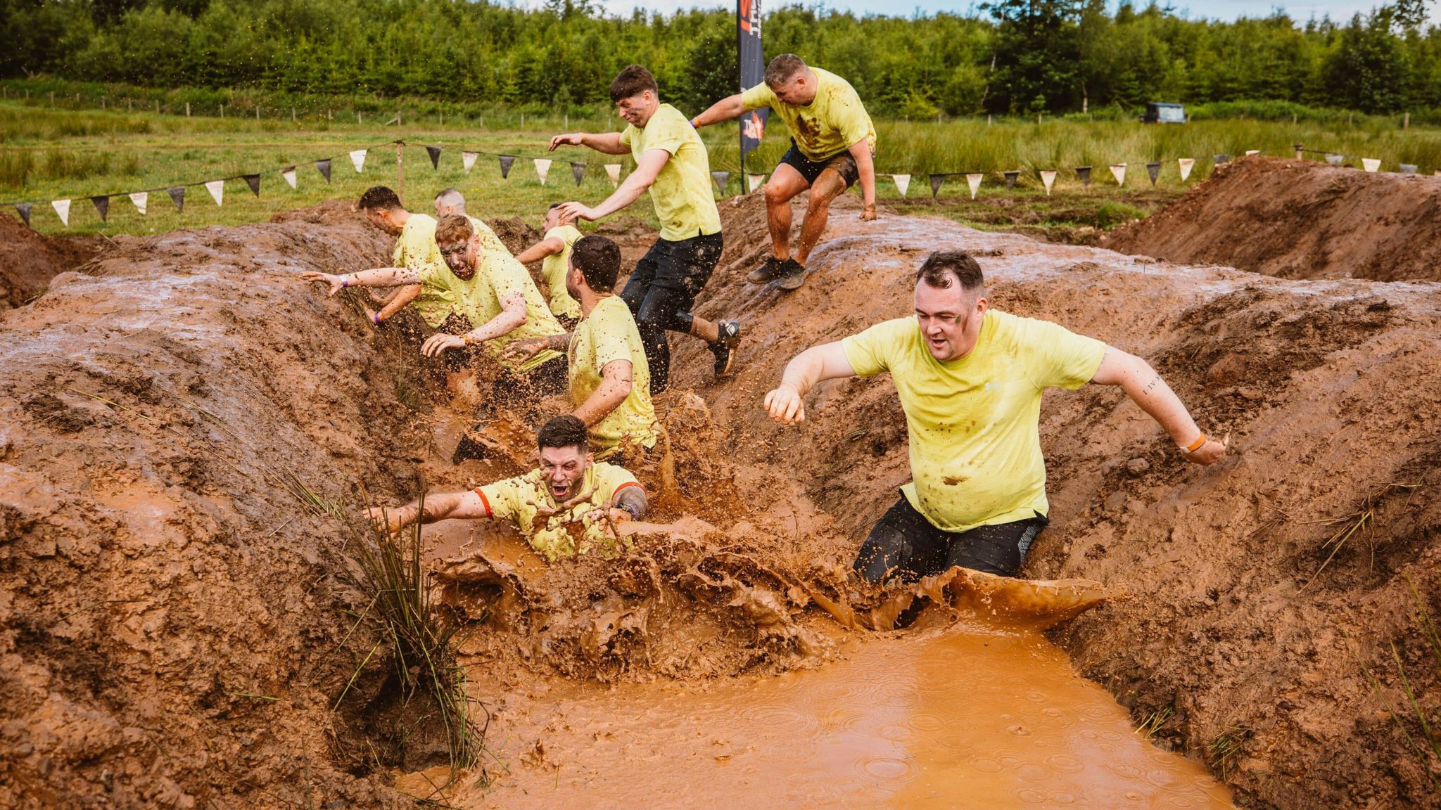 Thousands embrace Tough Mudder and the Eden Festival - BBC News