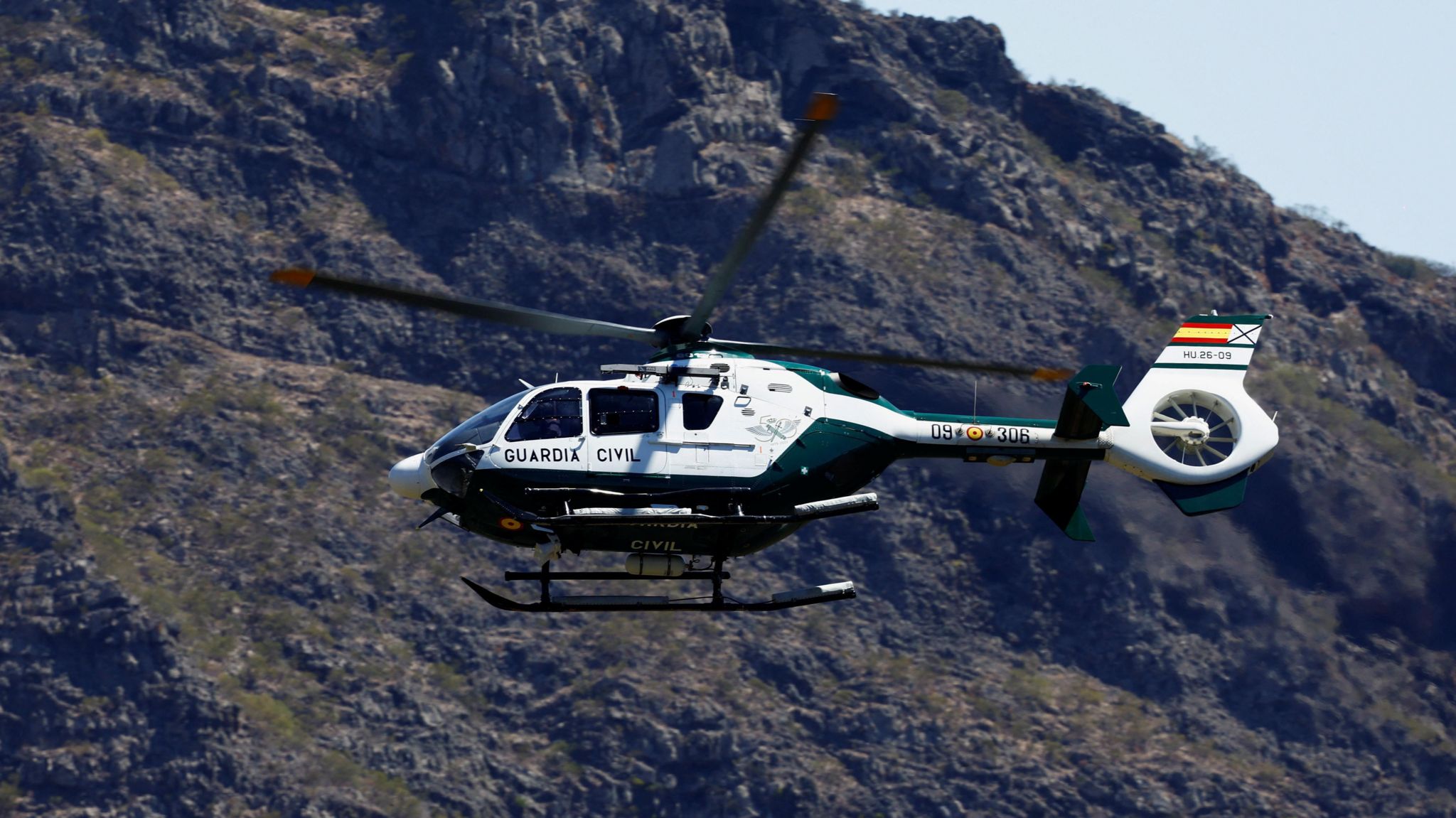A Guardia Civil helicopter searches for missing British teenager Jay Slater in the Masca ravine