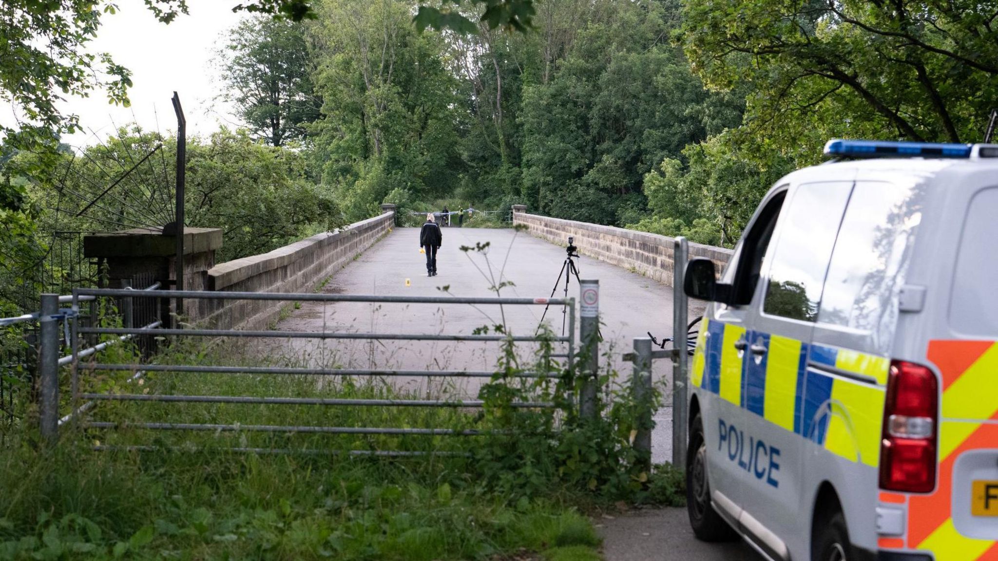 A police van parked in front of Nidd Viaduct