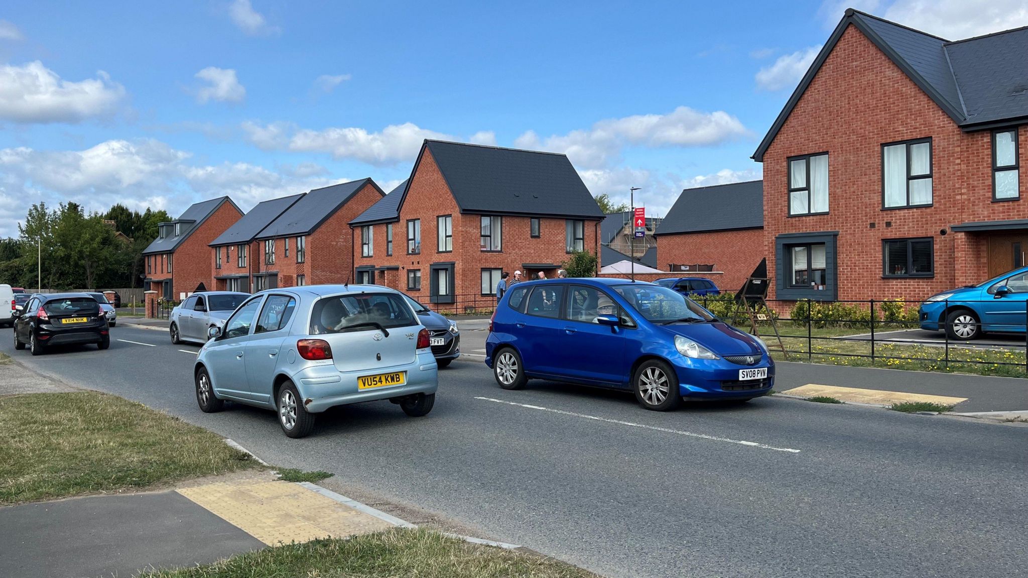 Lots of cars on Innsworth Lane outside Whittle Gardens estate in Gloucester