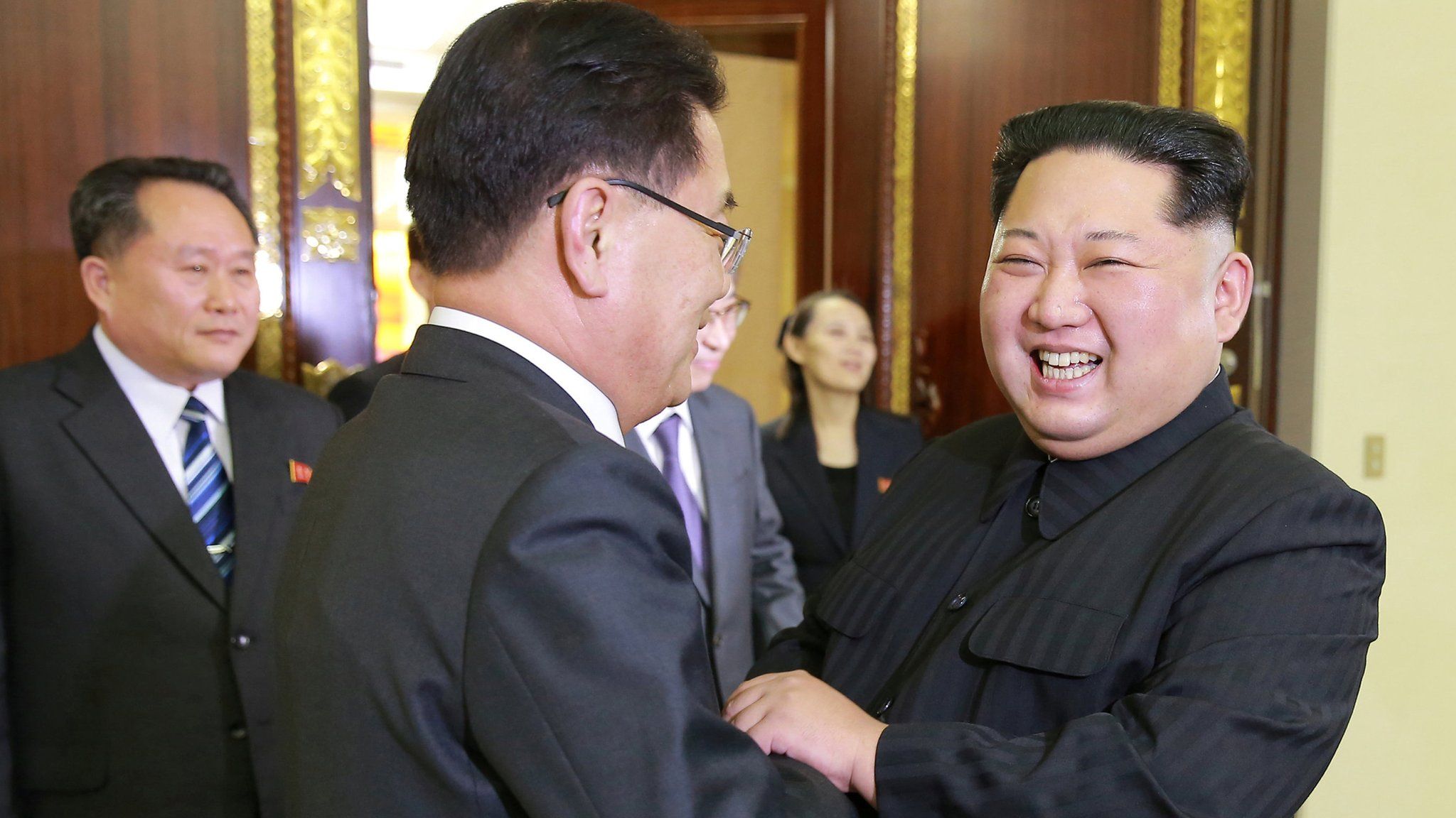 North Korean leader Kim Jong-un greets a member of the delegation of South Korea's president on March 6, 2018
