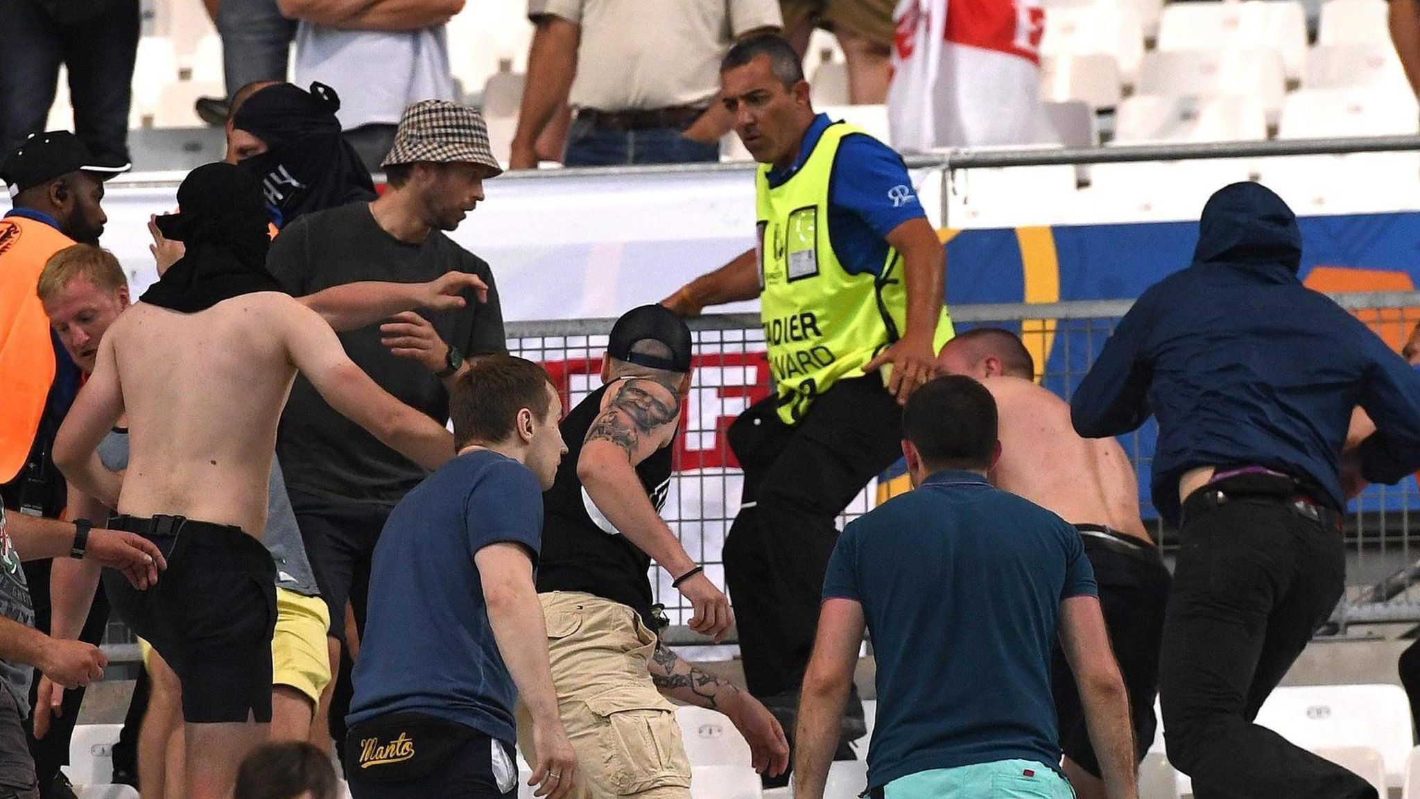 Supporters clash in the stands after England-Russia match
