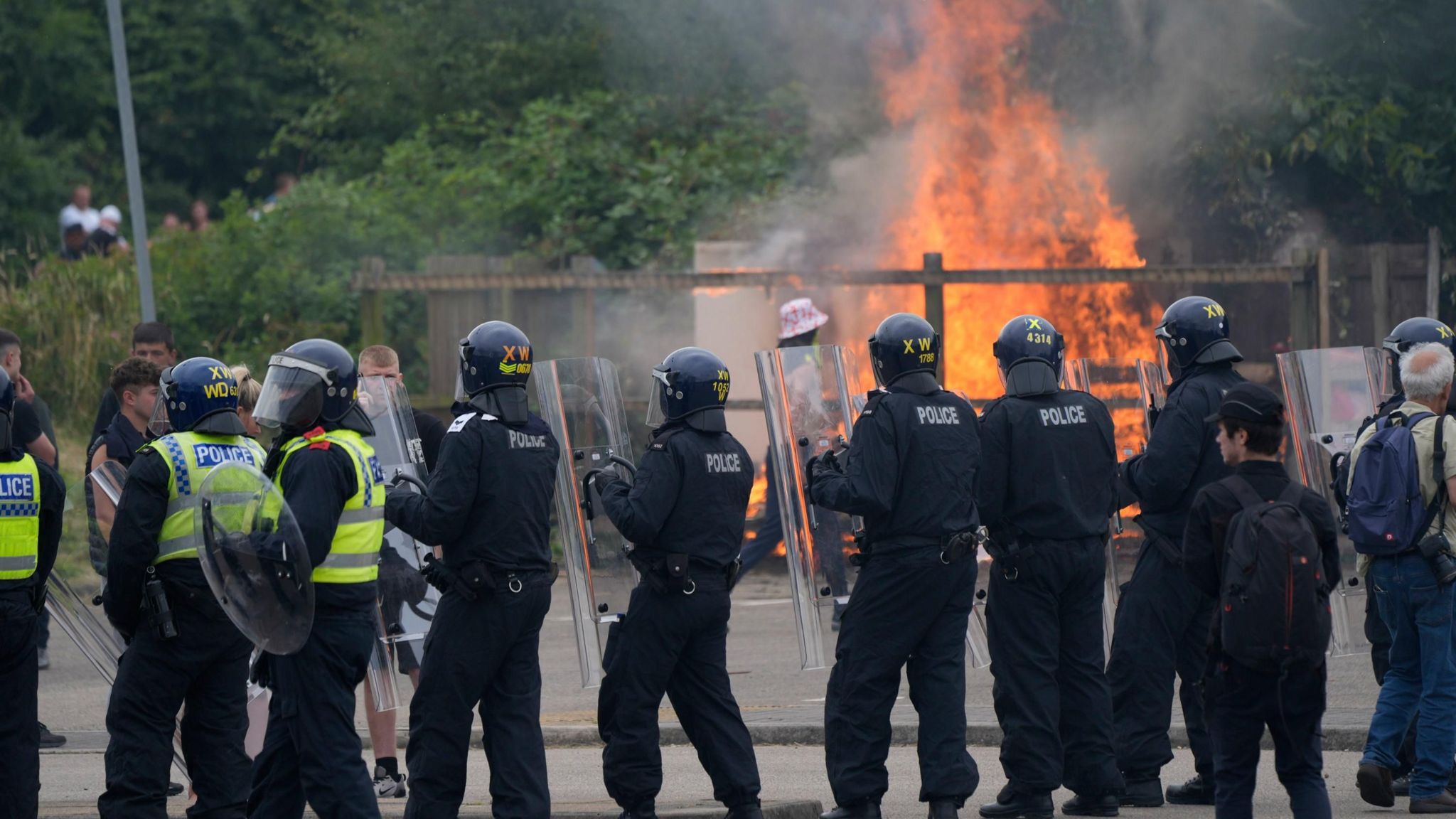 Trouble flares during an anti-immigration demonstration outside the Holiday Inn Express in Rotherham