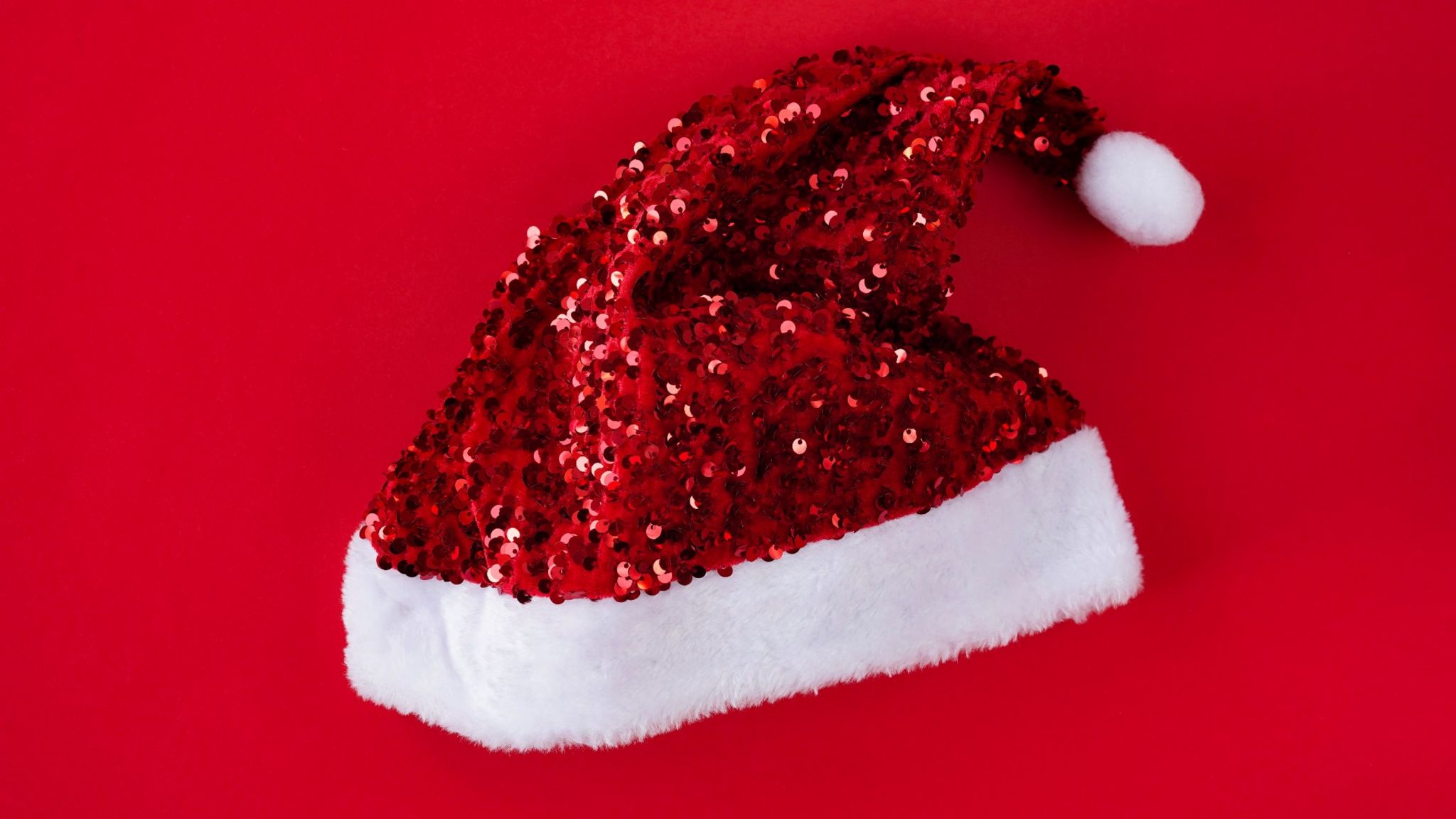A santa hat decorated with sequins