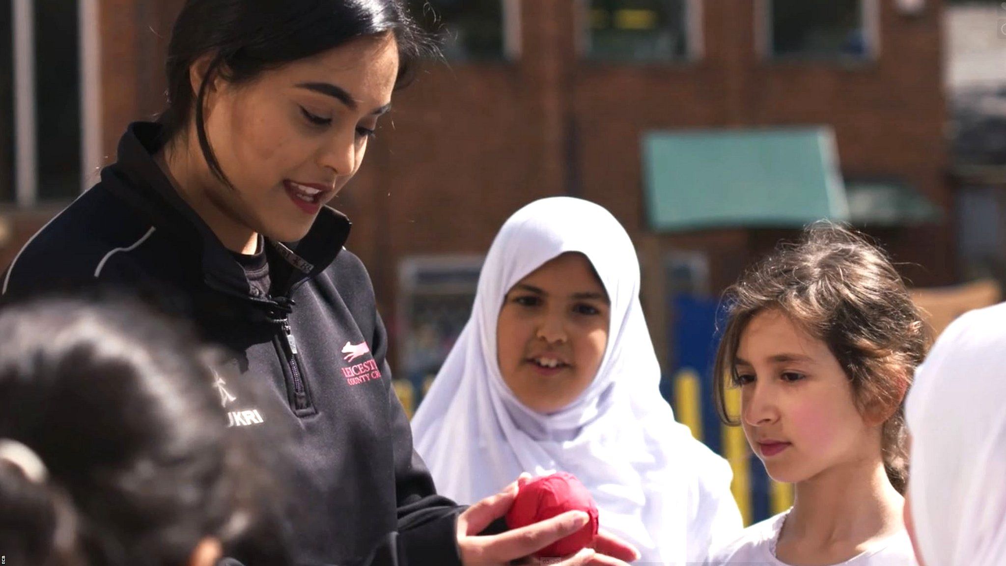 Amna Rafiq working with South Asian schoolchildren in Leicestershire