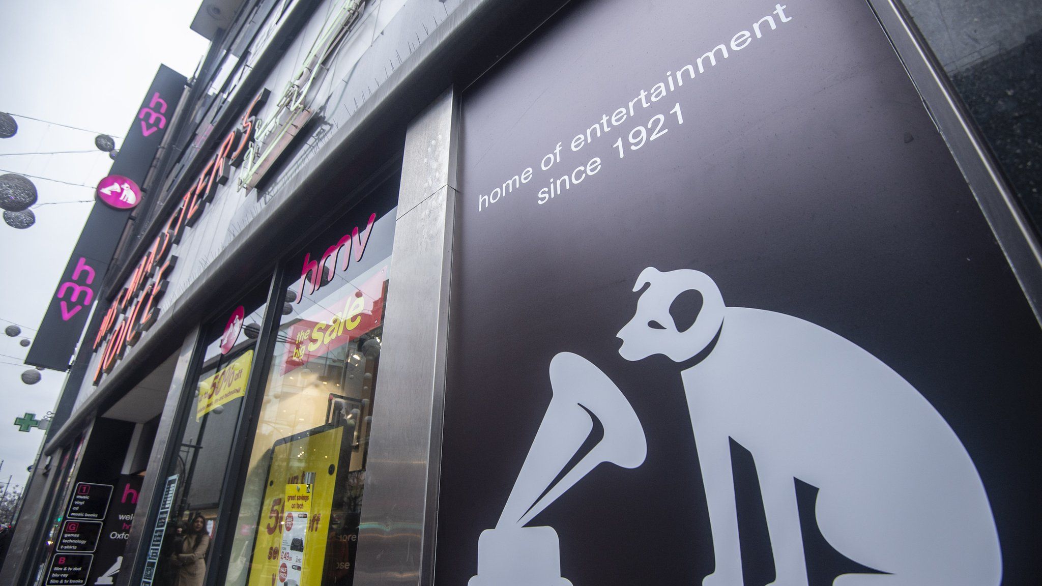 A picture shows the signage on the front of a HMV store in central London on December 28, 2018. - British music retailer HMV, which was launched by English composer Edward Elgar in 1921, has collapsed into administration after weak Christmas sales and amid a declining market for CDs and DVDs, its owner said on December 28