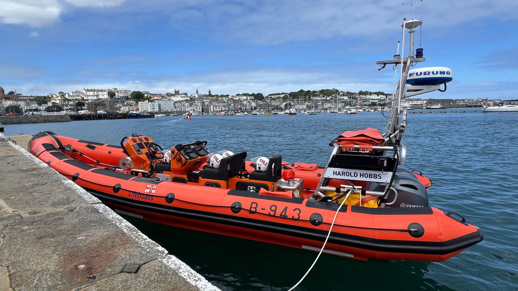 The red Harold Hobbs boat on the sea 