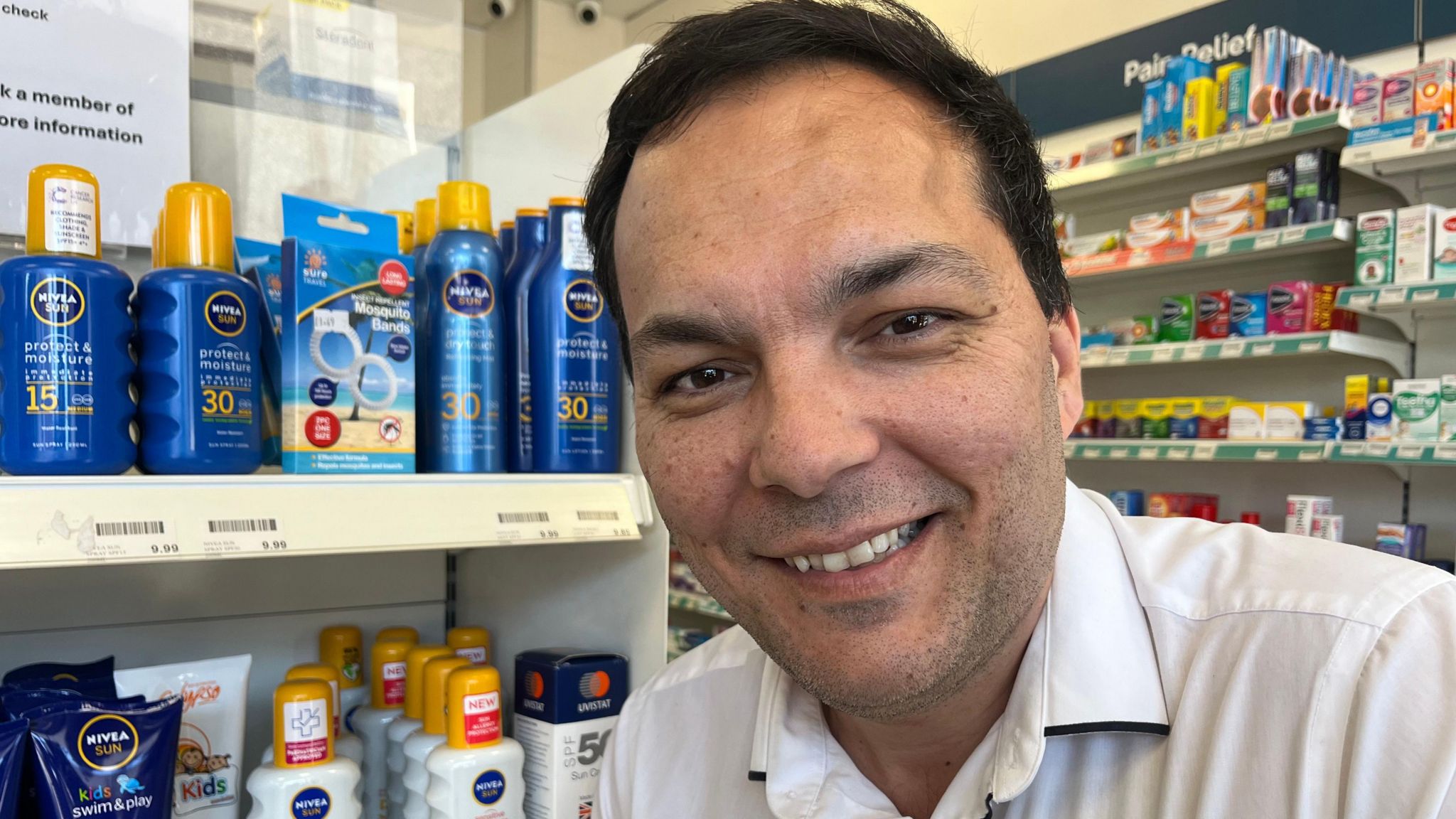 Mansour Dadkhah smiling in his pharmacy 