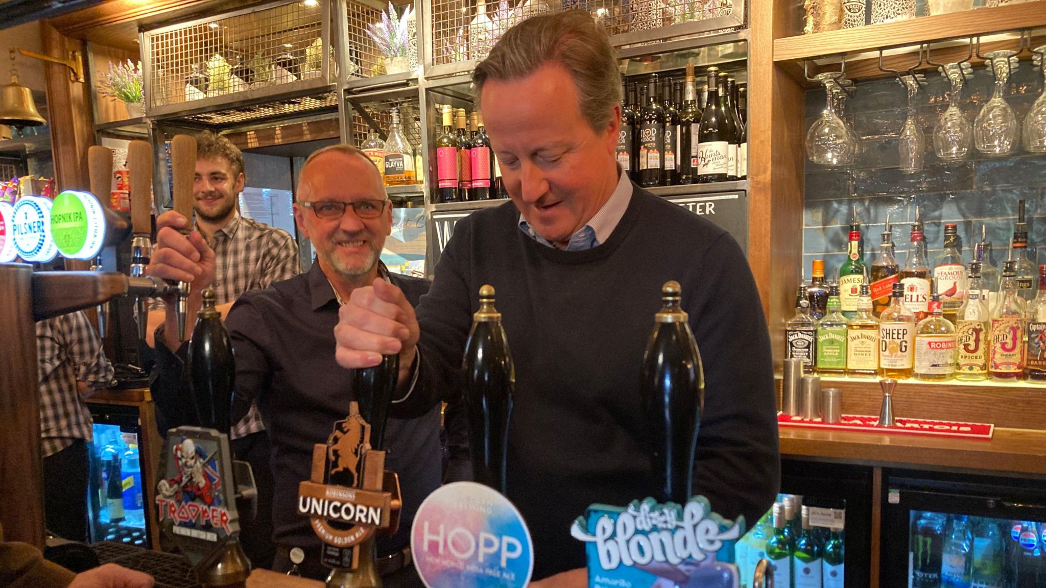 Lord Cameron pours a pint in Macclesfield