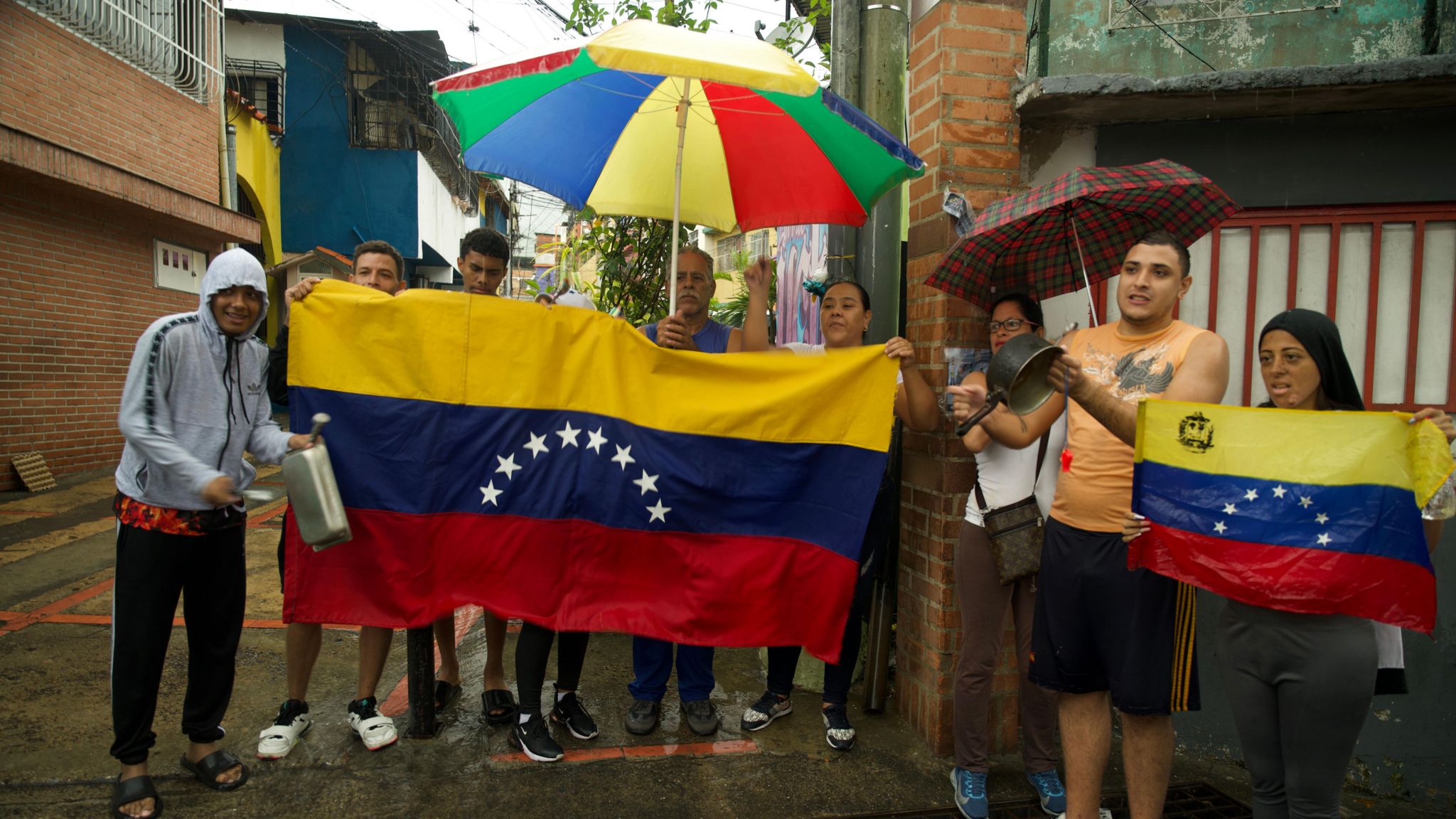 Paola and Miguel Sarzalejo, and other protesters