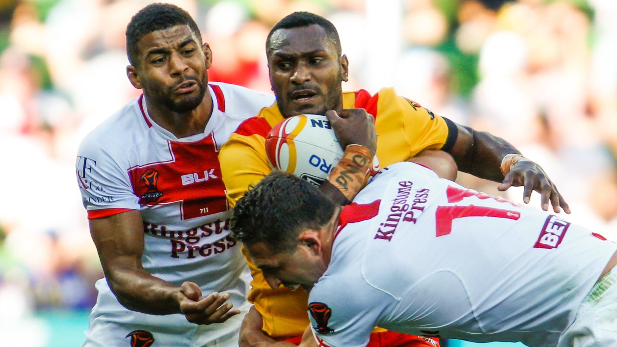 Kato Ottio (centre) played for Papua New Guinea in their quarter-final loss to England at the Rugby League World Cup in November