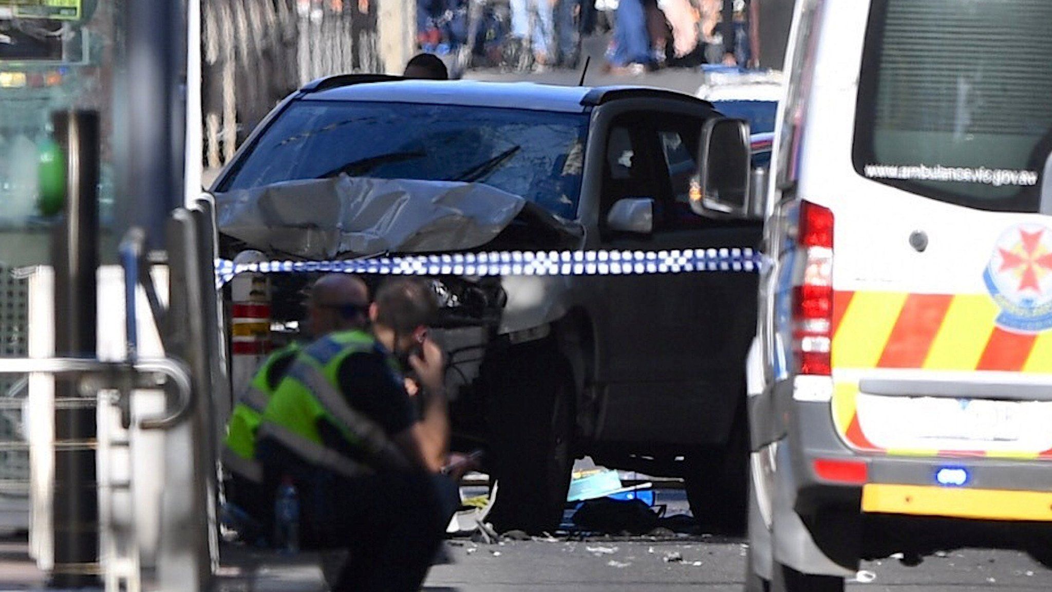 A crashed car that struck pedestrians on Flinders Street, Melbourne, 21 December