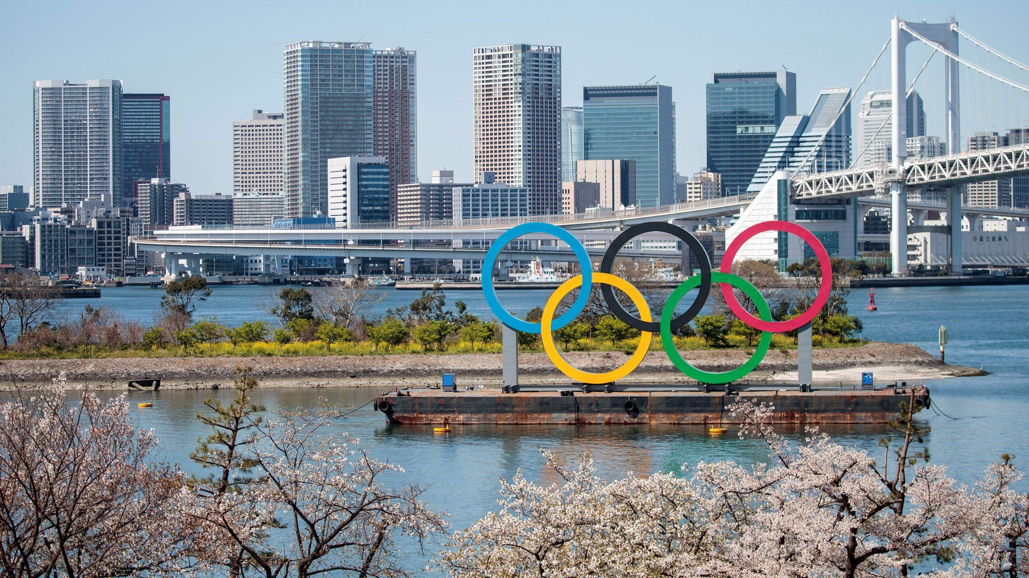 A general picture of the Tokyo skyline with the Olympic rings in the foreground