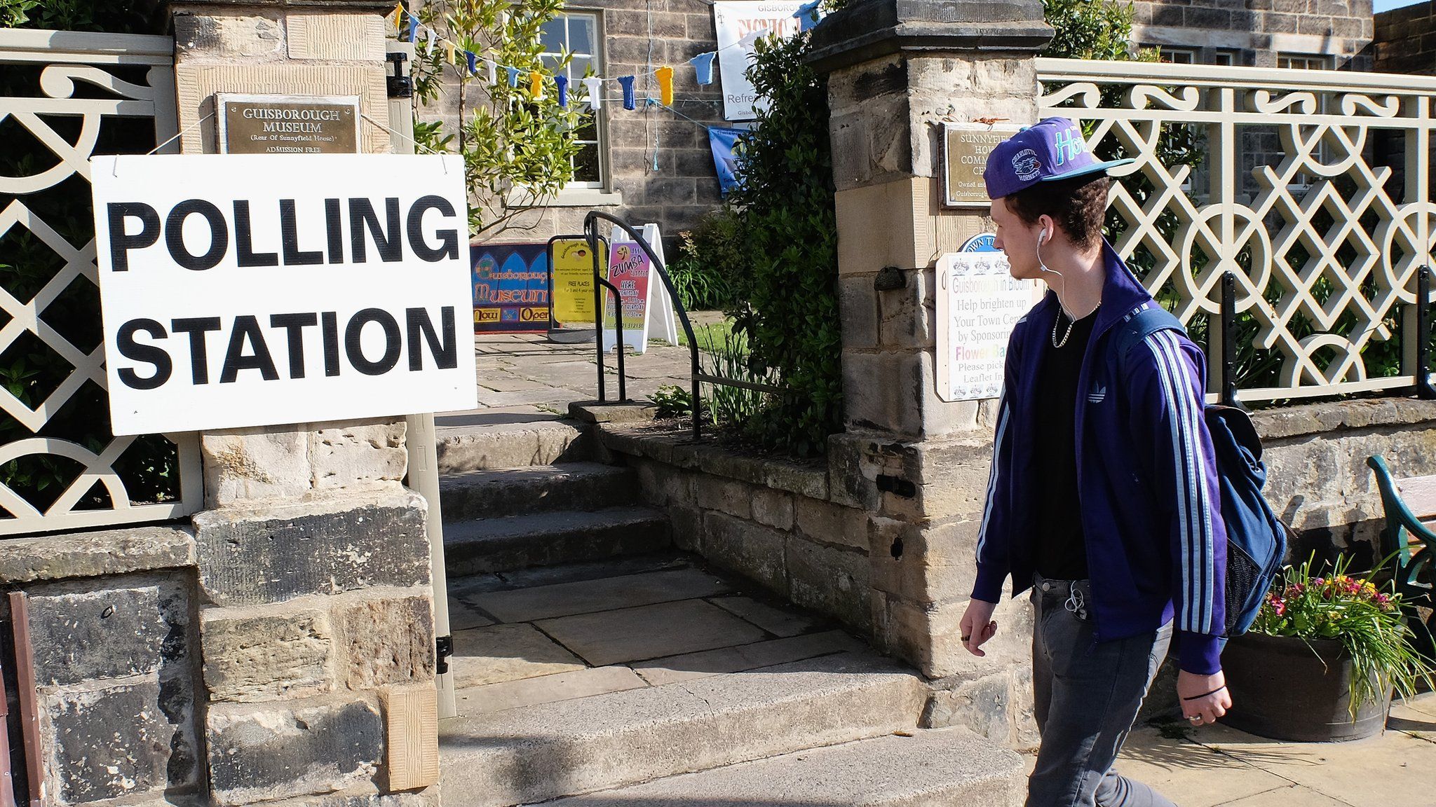 young person outside a polling station