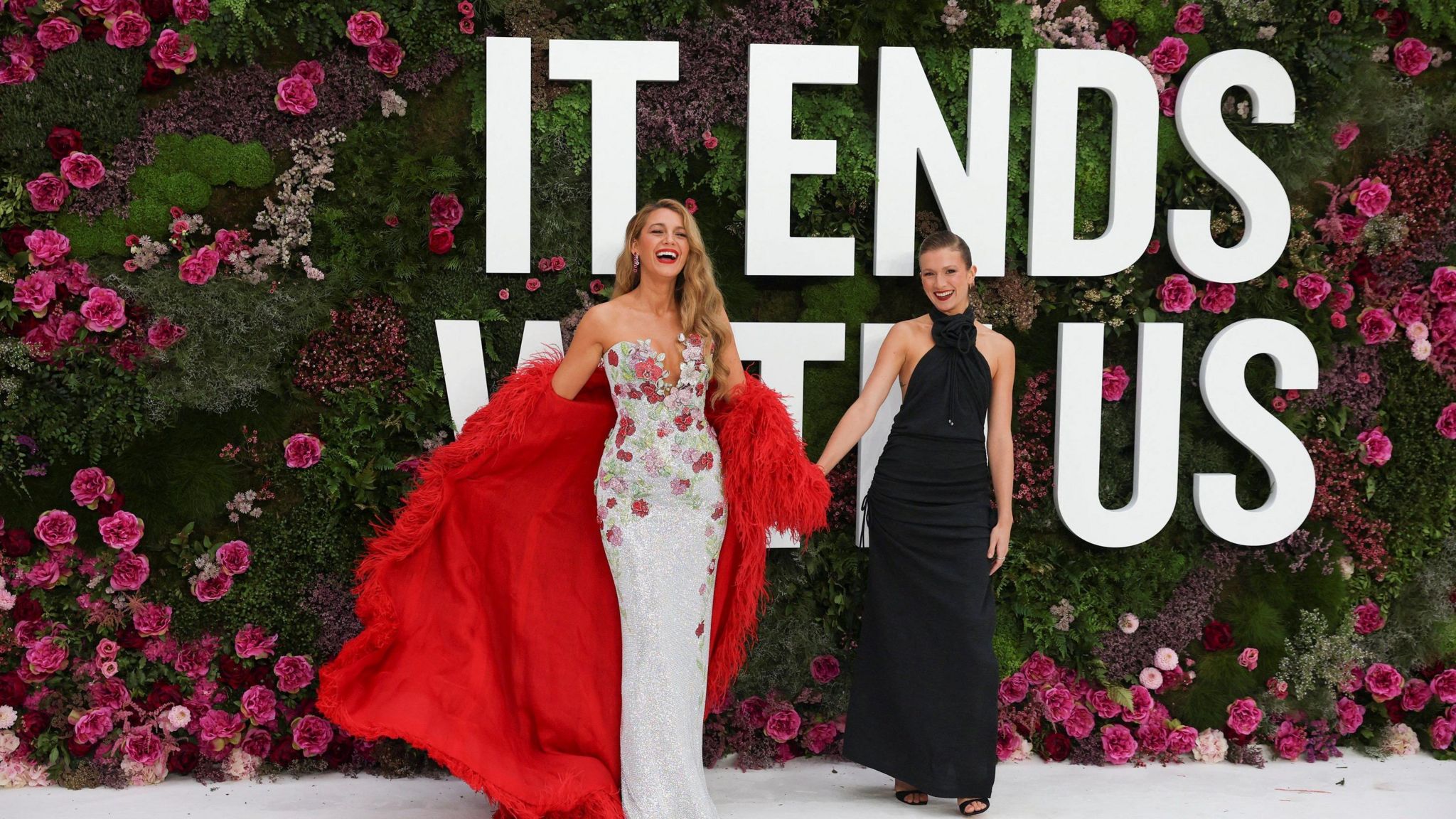 Blake Lively (left) and a co-star at a red-carpet premiere of the film