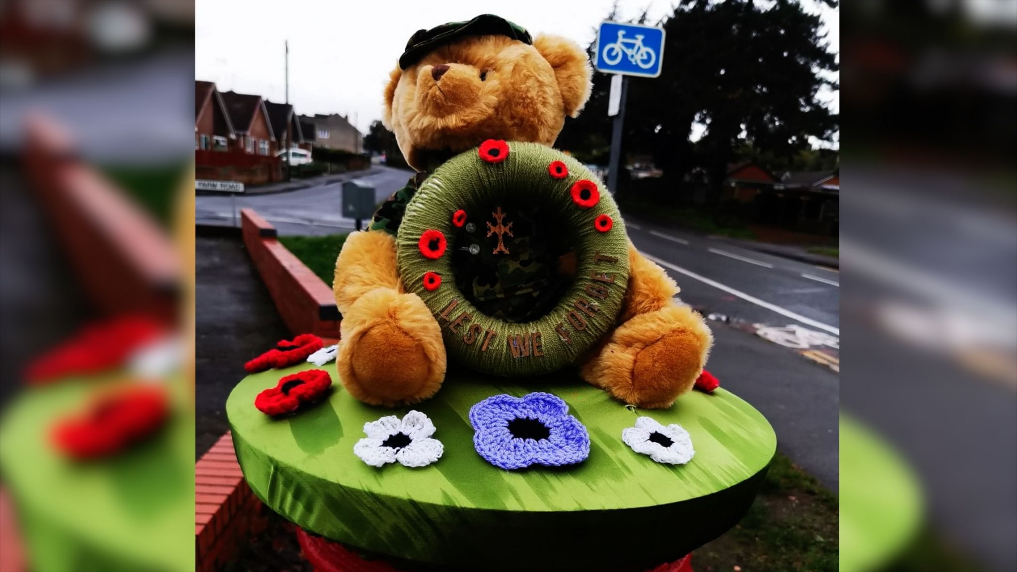 A teddy bear soldier holds a wreath in Mansfield, Nottinghamshire
