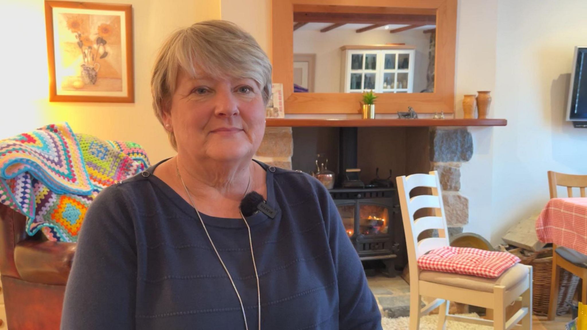 Woman sat in living room