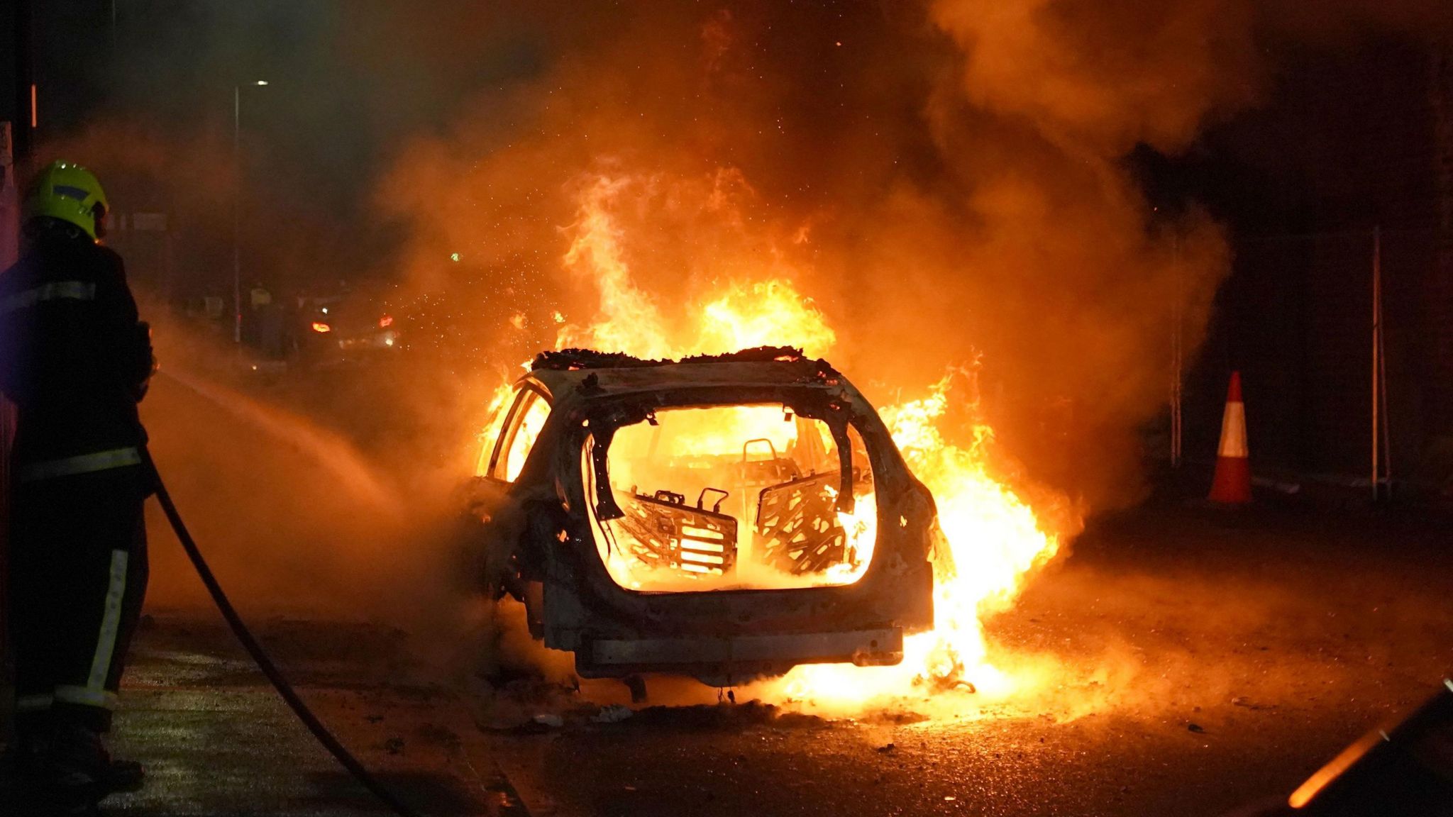 A burning police car.