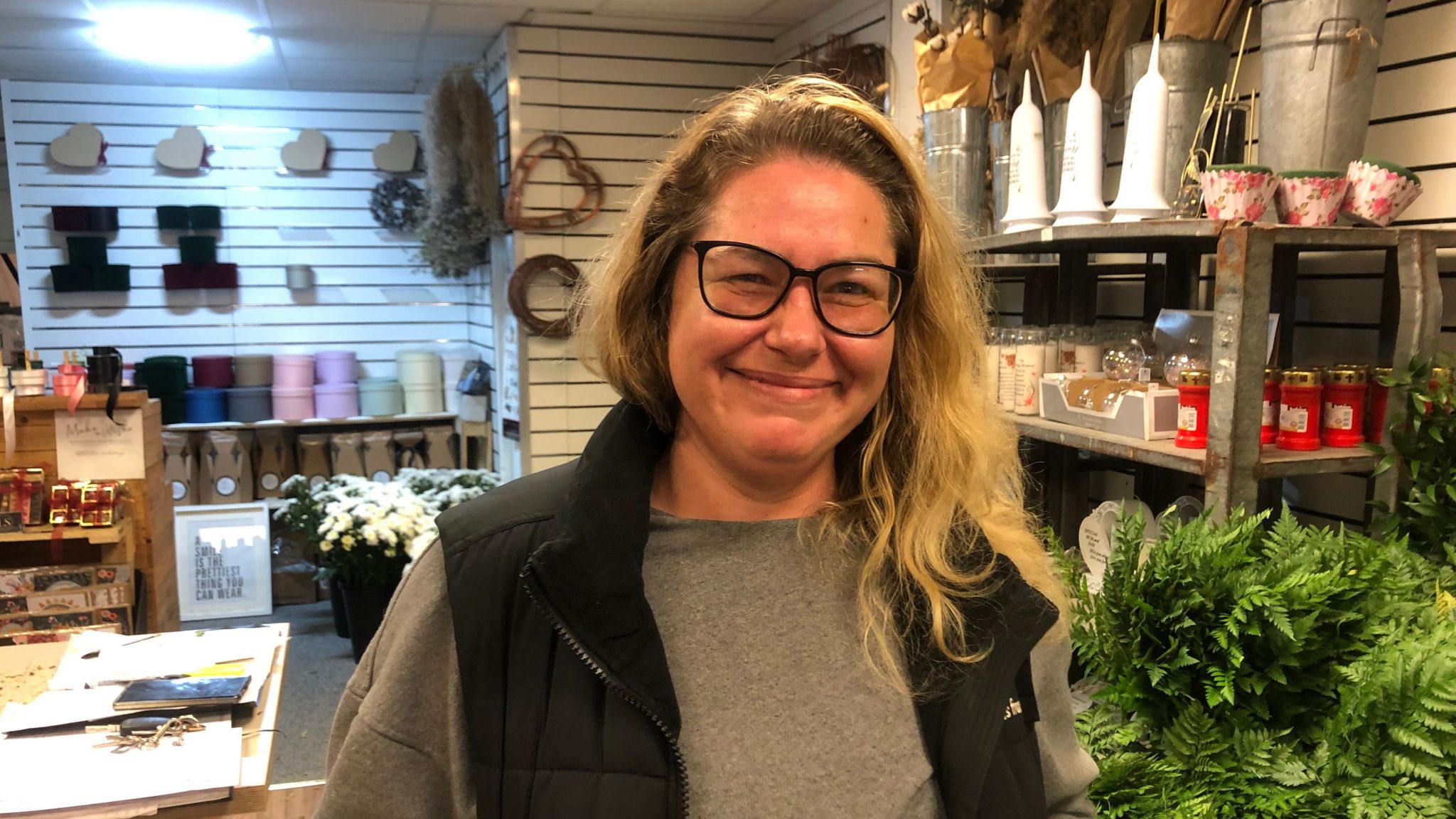 Becky Rees standing in her florist shop in Tredegar