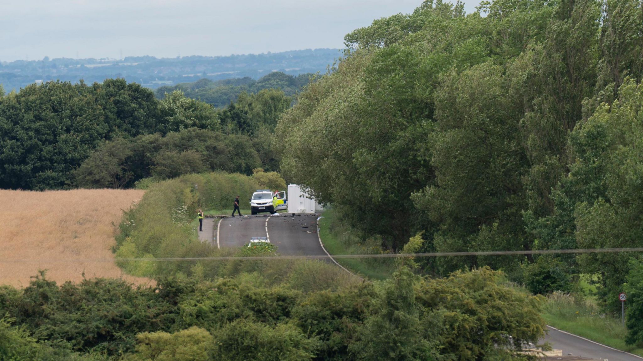 The scene on the A61 in Wakefield, following a collision between a car and a motorcycle on Sunday afternoon in which four adults and two children died.