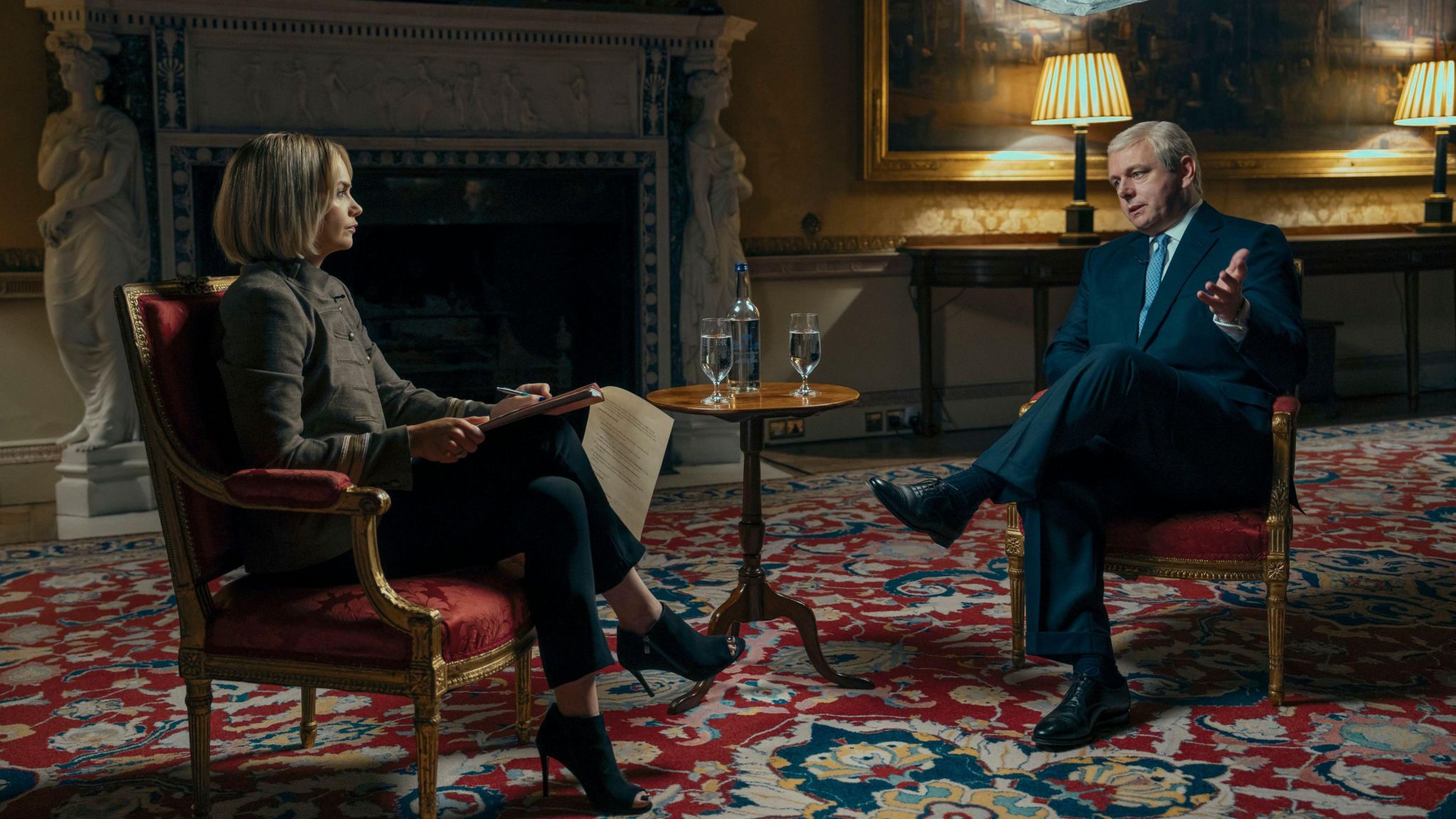 Actors Ruth Wilson and Michael Sheen as Emily Maitlis and the Duke of York in 'A Very Royal Scandal' - a Prime Video series depicting the headline-making BBC Newsnight interview