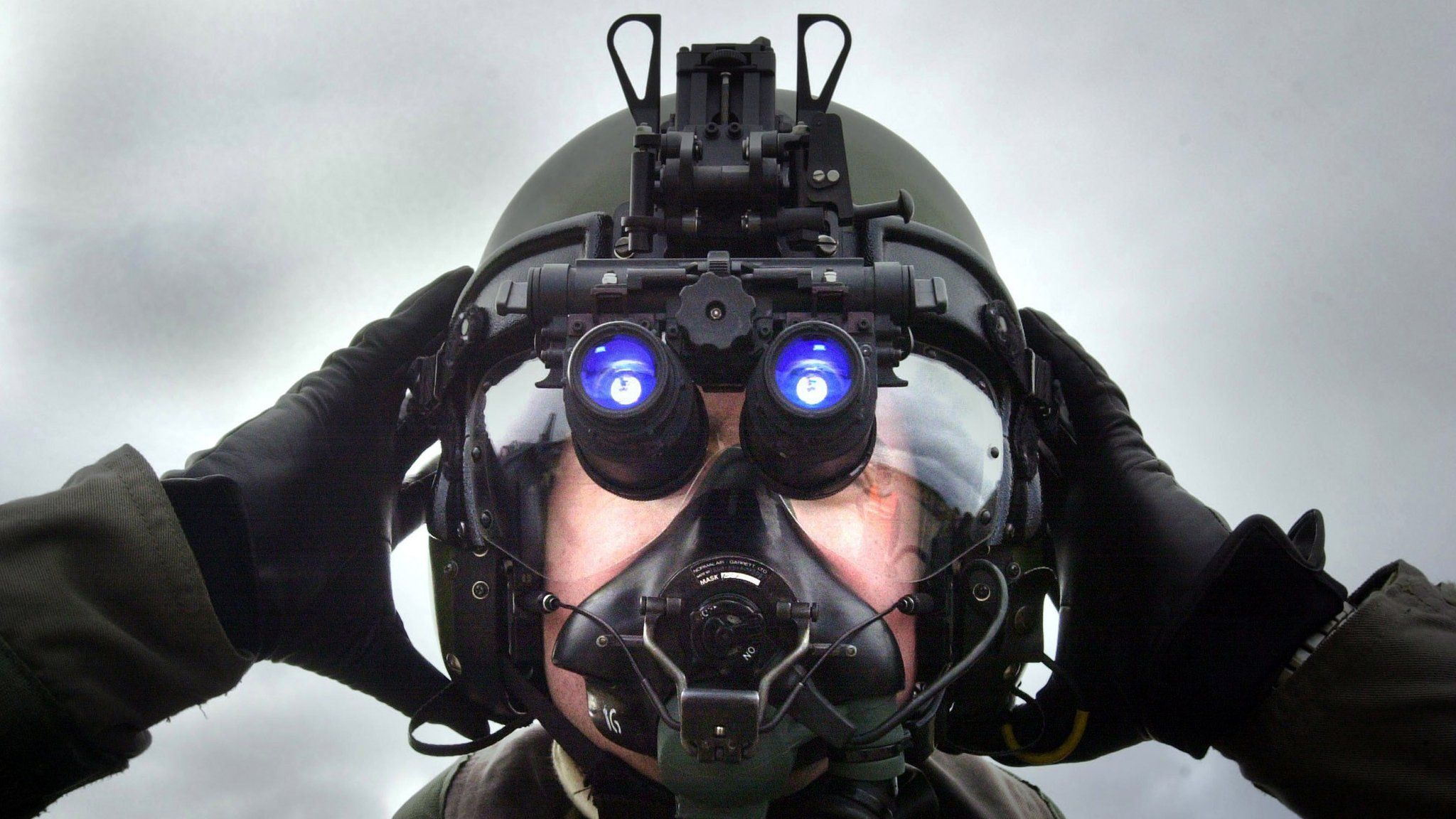 A pilot at RAF Lossiemouth, Scotland, wearing night vision device