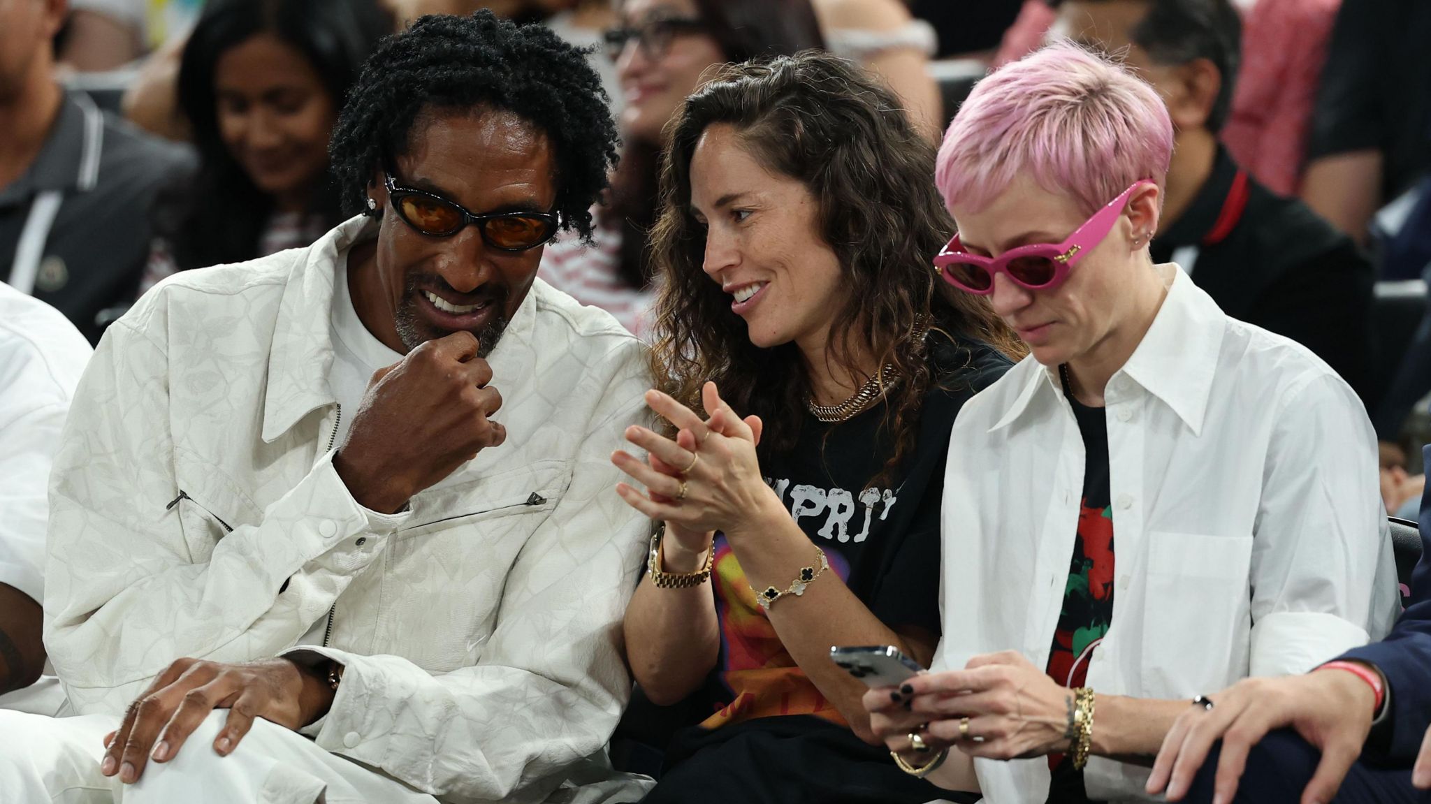 Scottie Pippen, Sue Bird and Megan Rapinoe sit courtside