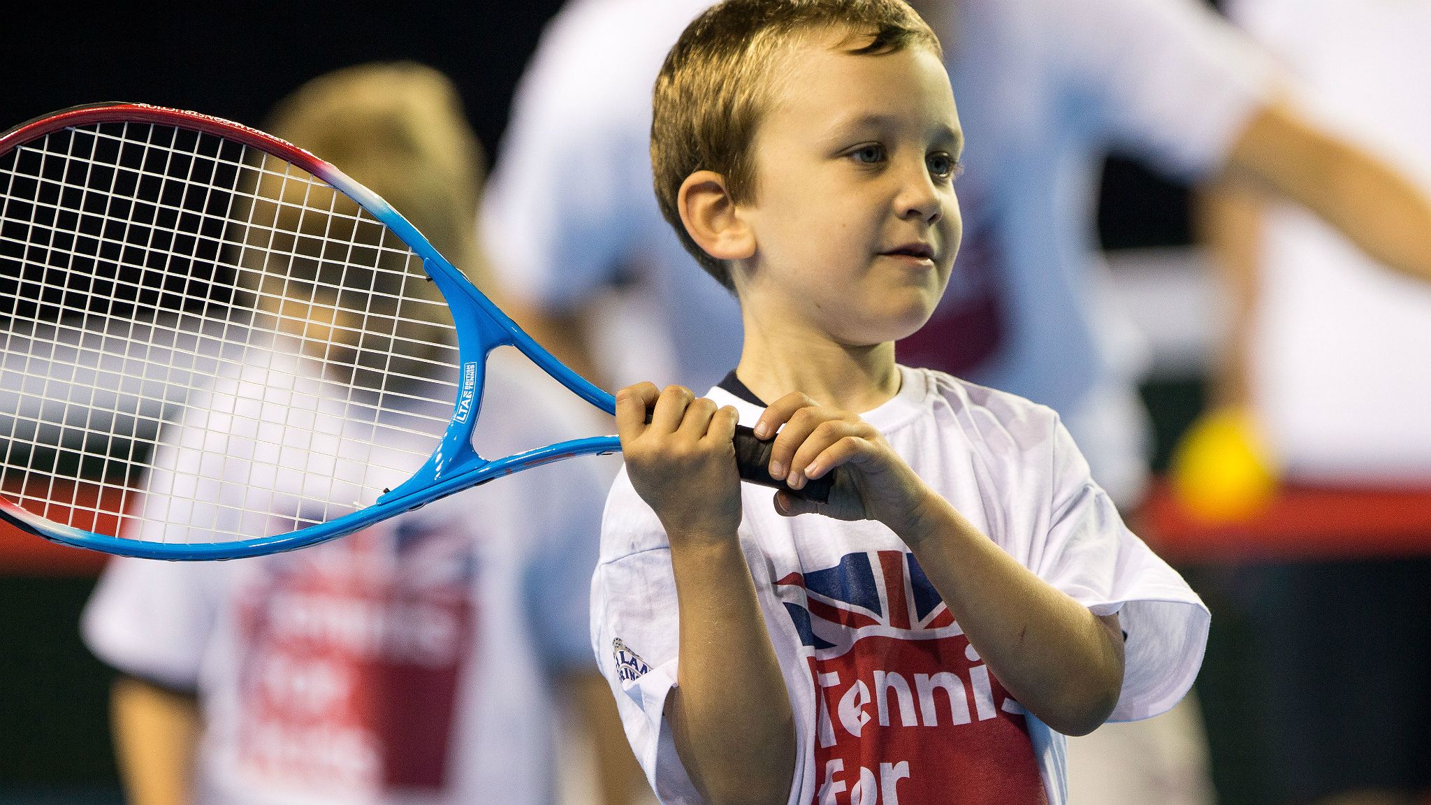 Child taking part in a Tennis for Kids session
