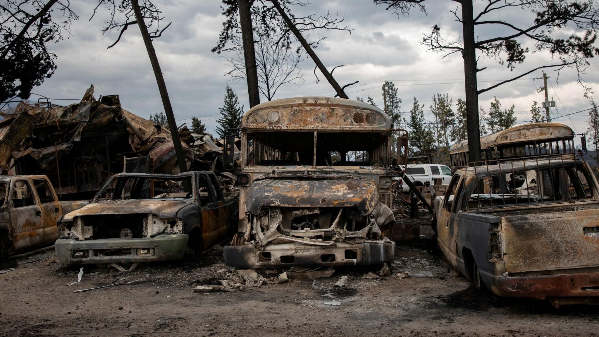 Jasper fire: Images show destruction from wildfire in Canada - BBC News