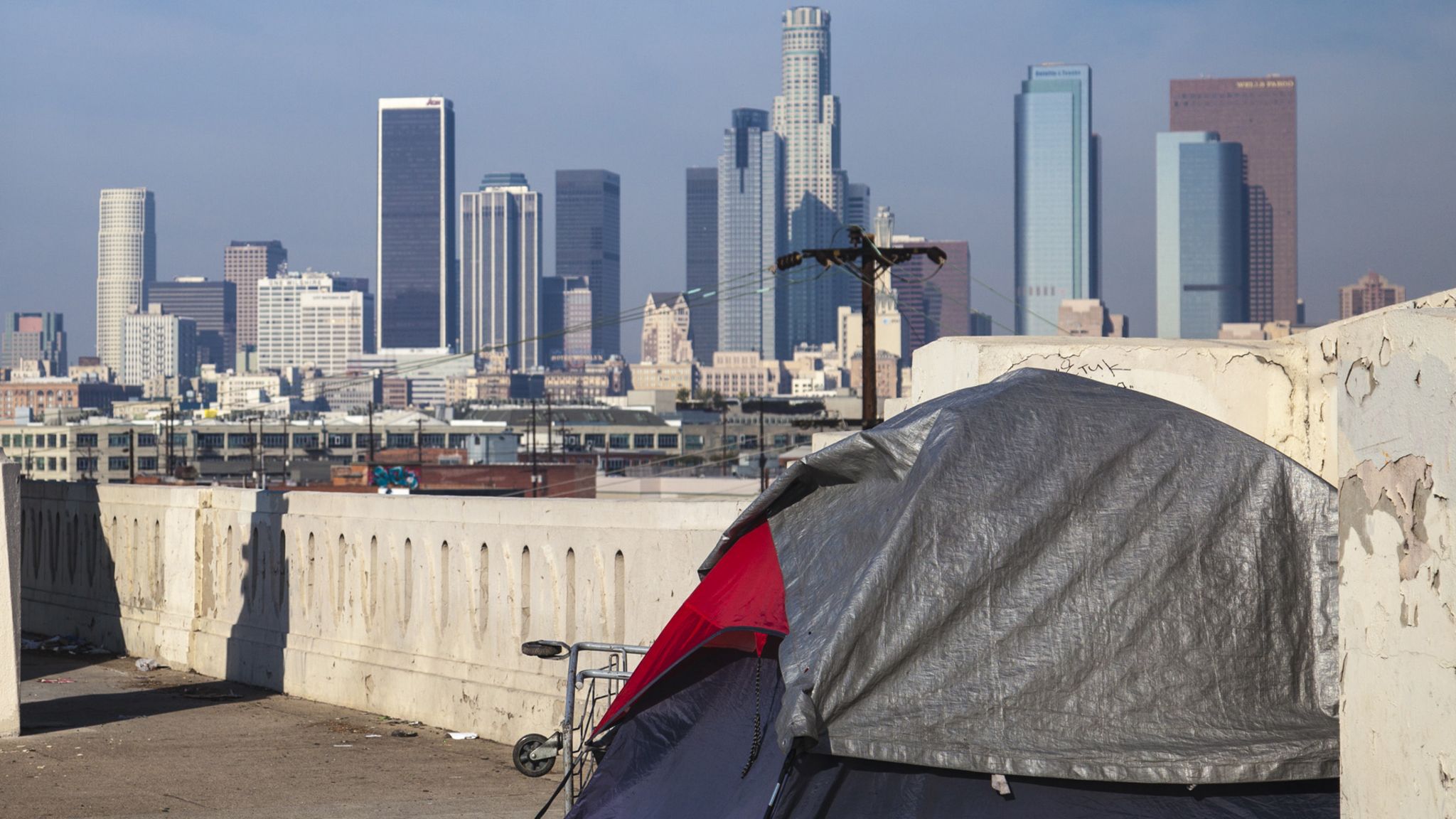 LA skyline and a tent