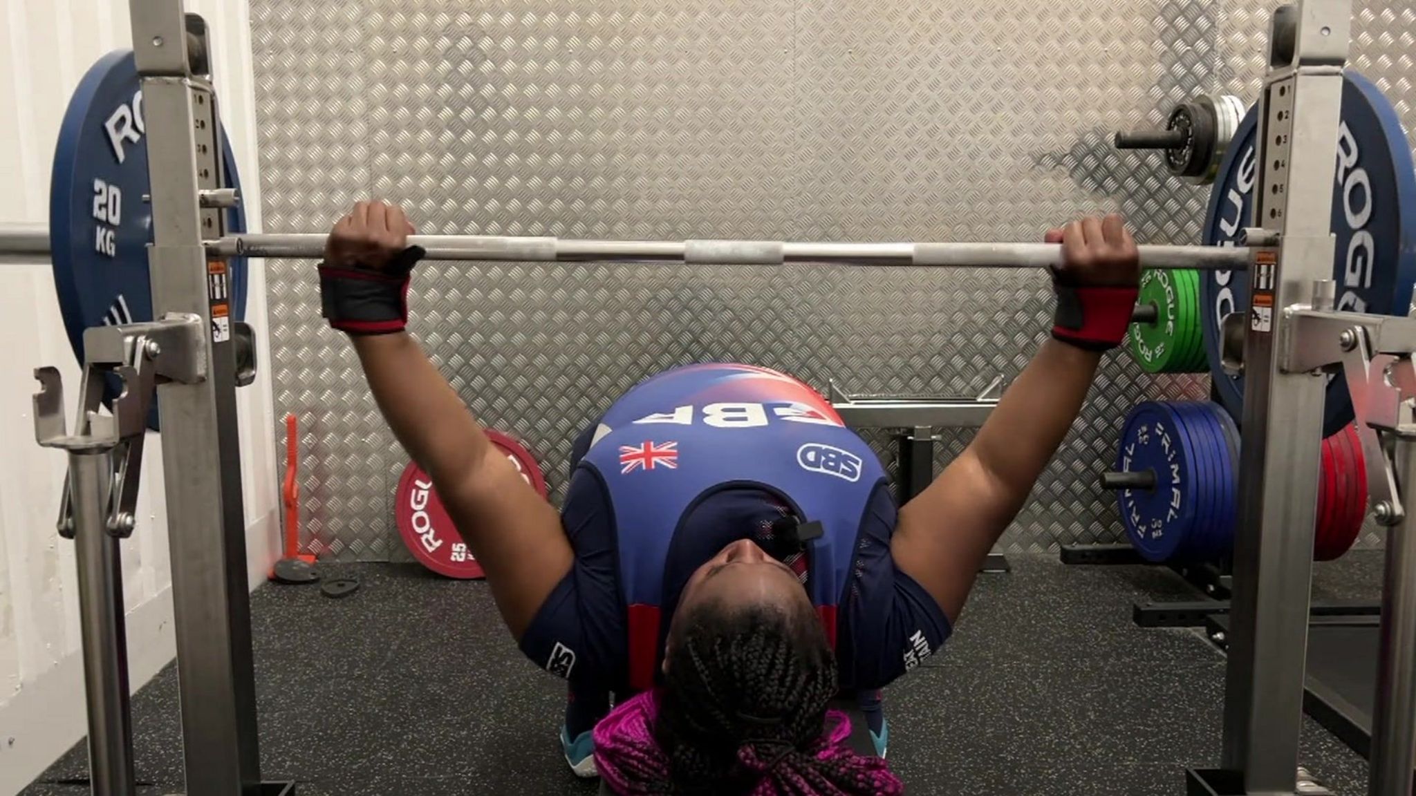 Elaine Jackson doing bench press. 
