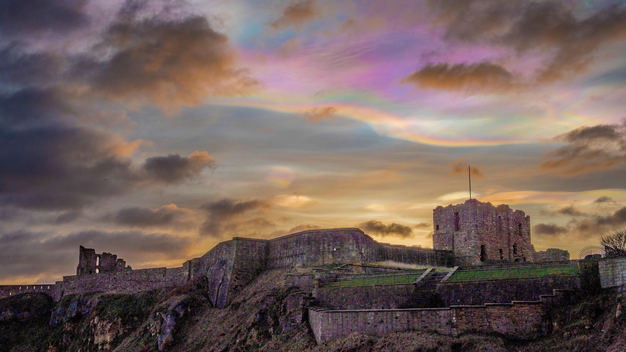 The mother of pearl clouds above The Priory in Tynemouth