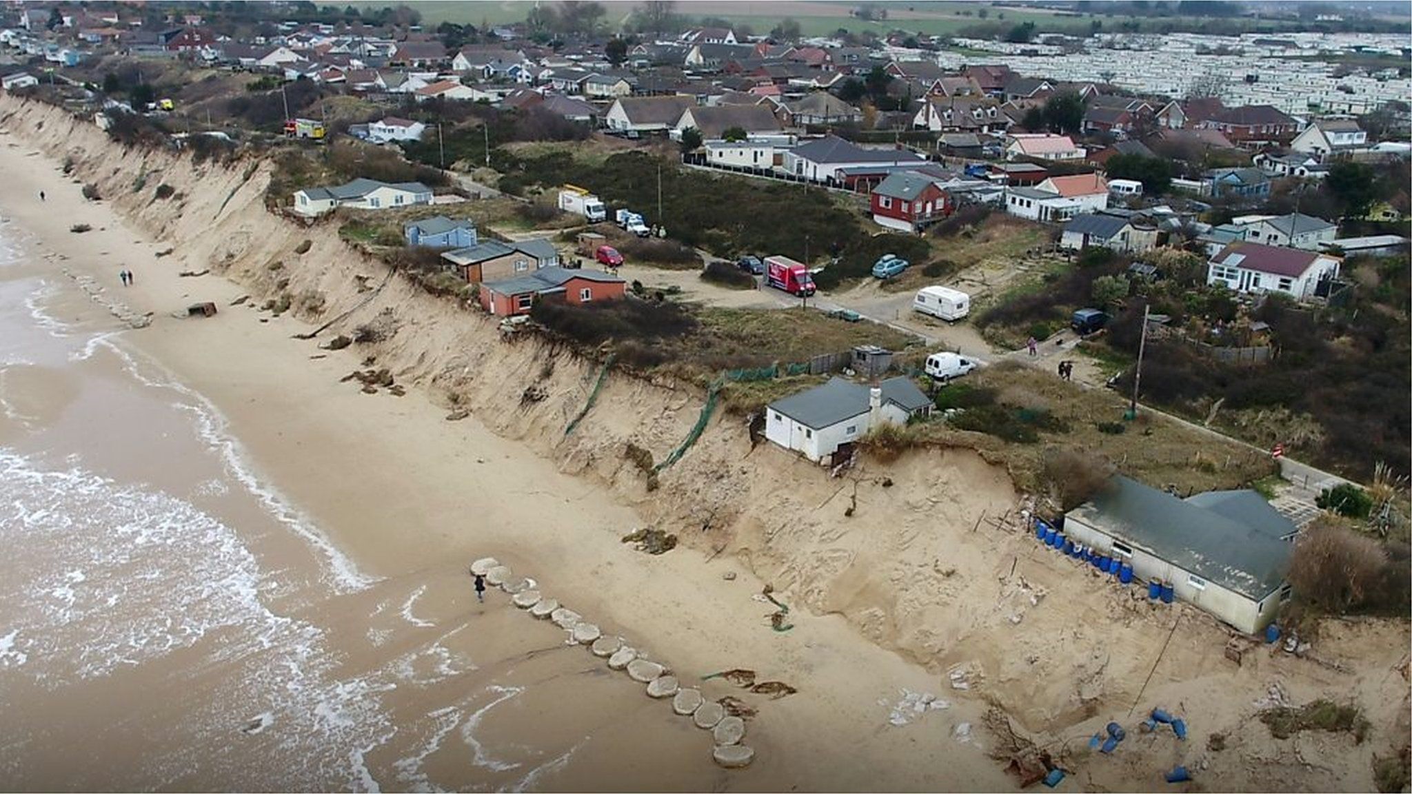 Aerial view of Hemsby homes on cliff