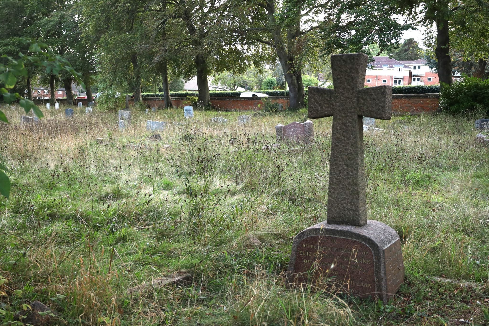 A gravestone in a cemetery 