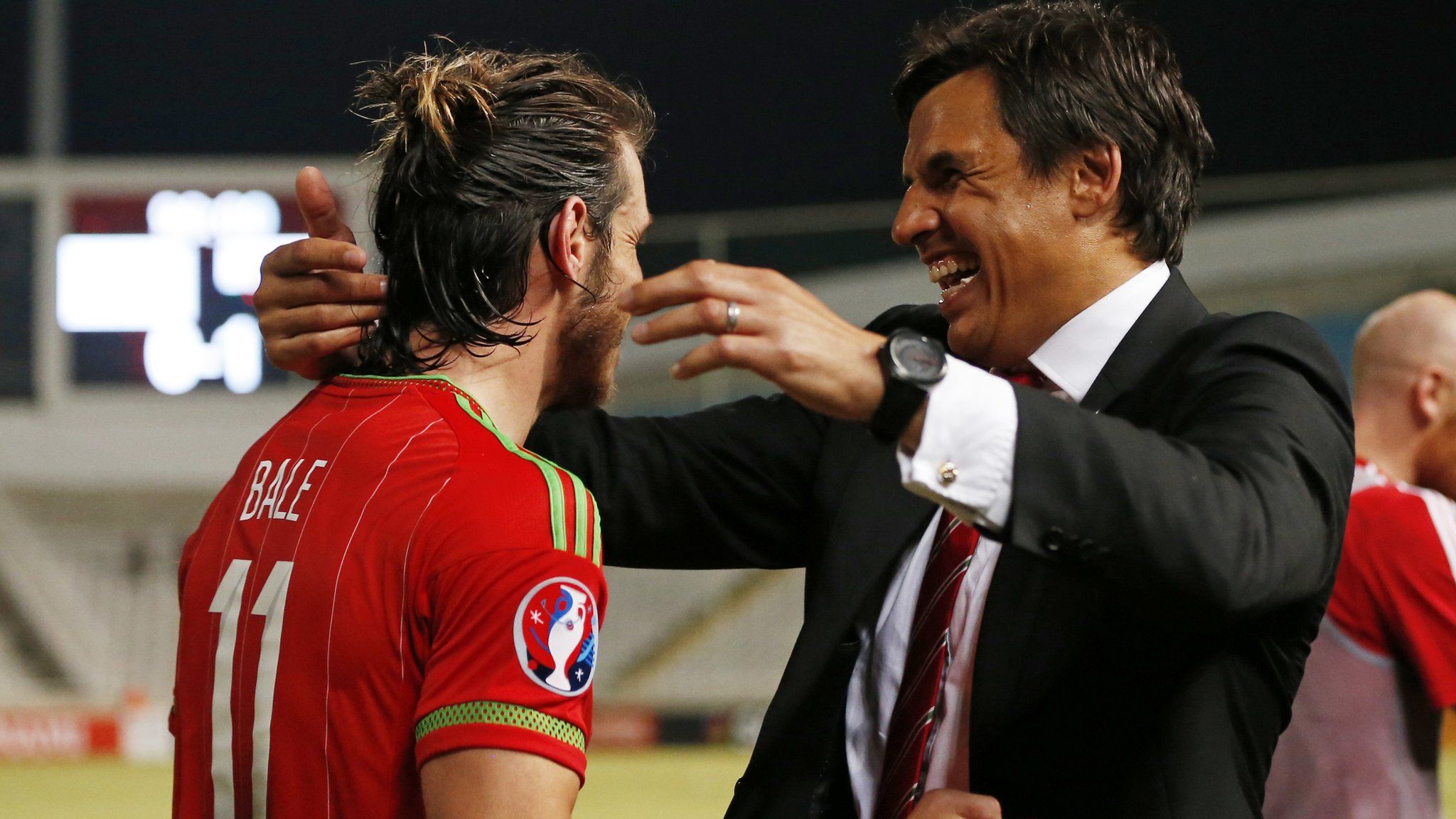 Gareth Bale Celebrates with manager Chris Coleman
