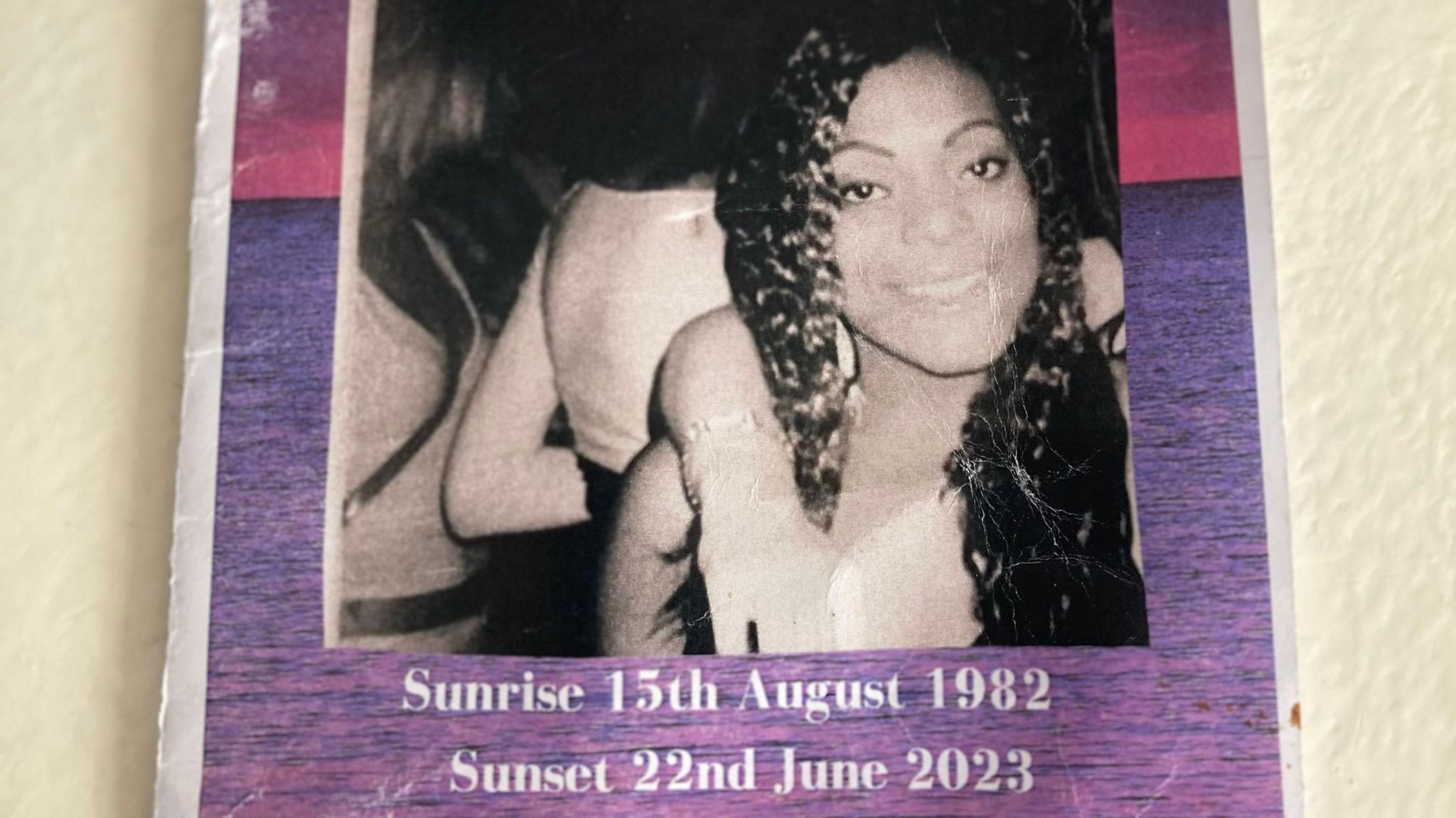 A poster with a Natasha Morais tribute which shows her picture 