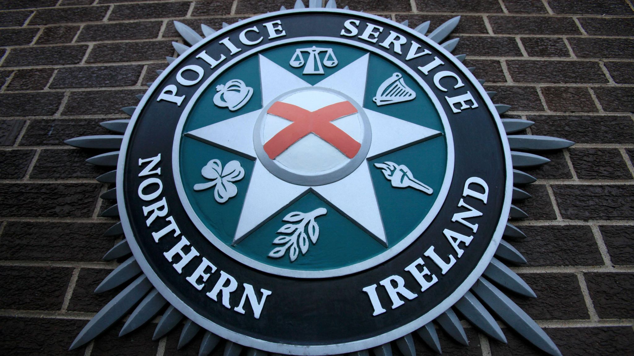 A coat of arms is pictured at the Police Service of Northern Ireland Headquarters. 