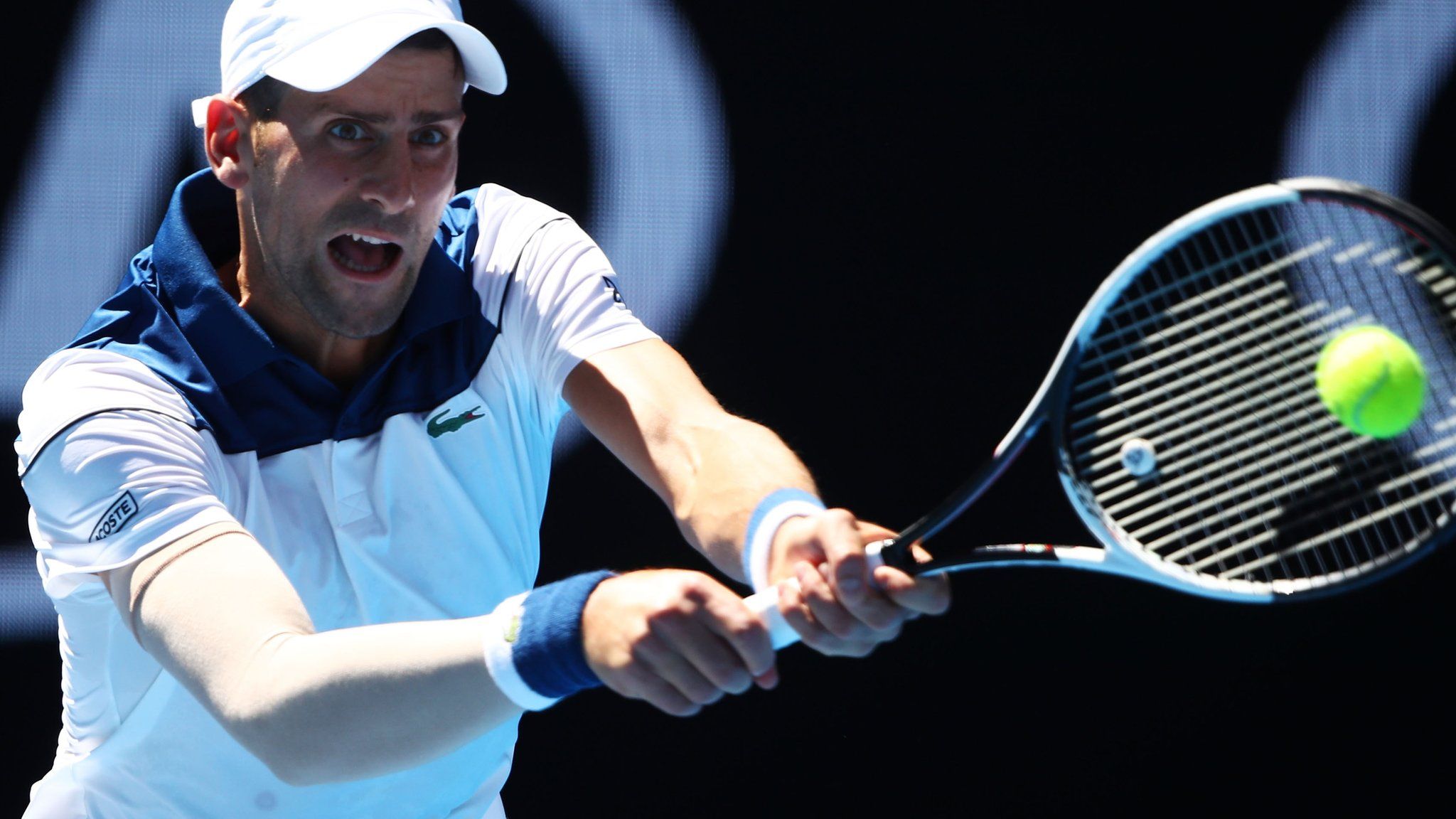 Novak Djokovic playing against Donald Young in the Australian Open
