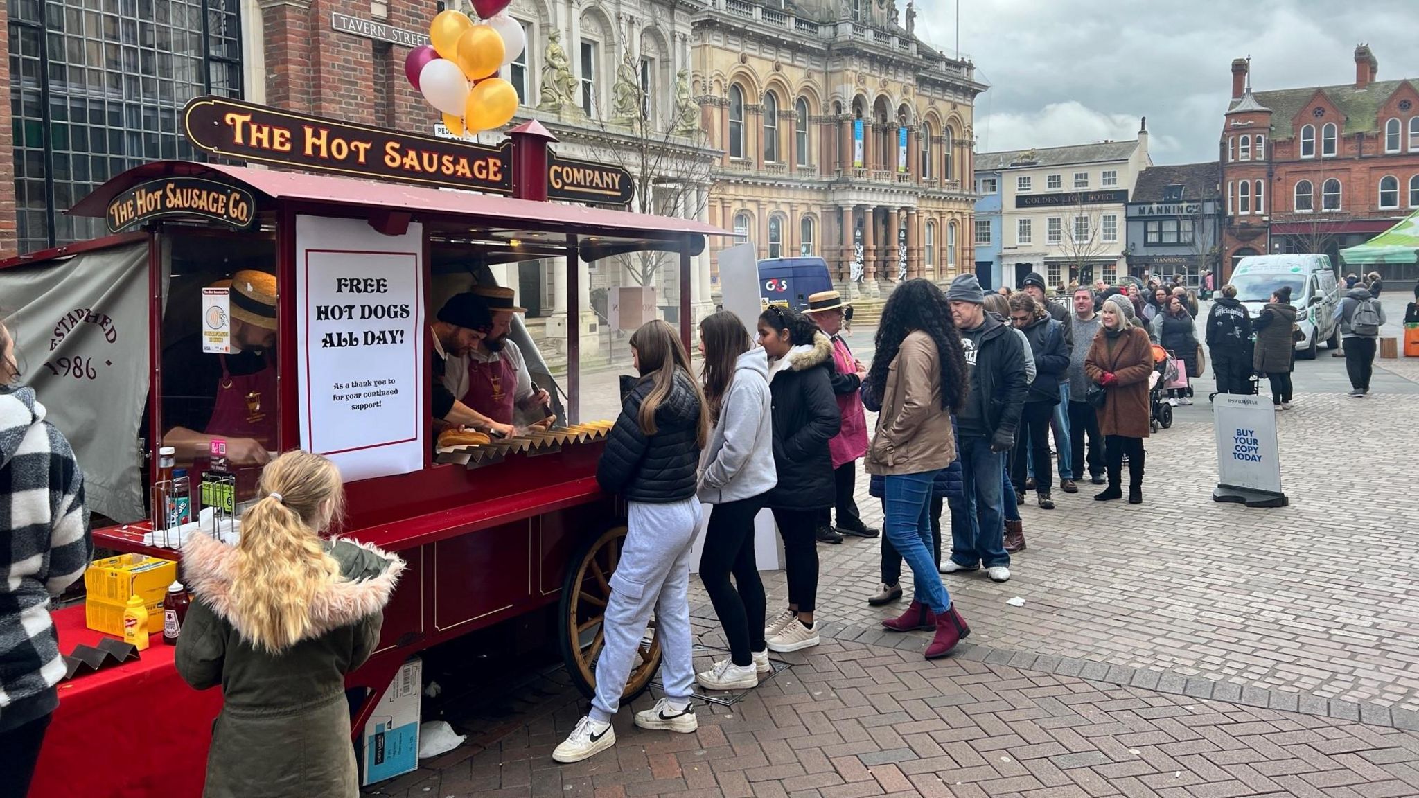 Queue for free hot dogs