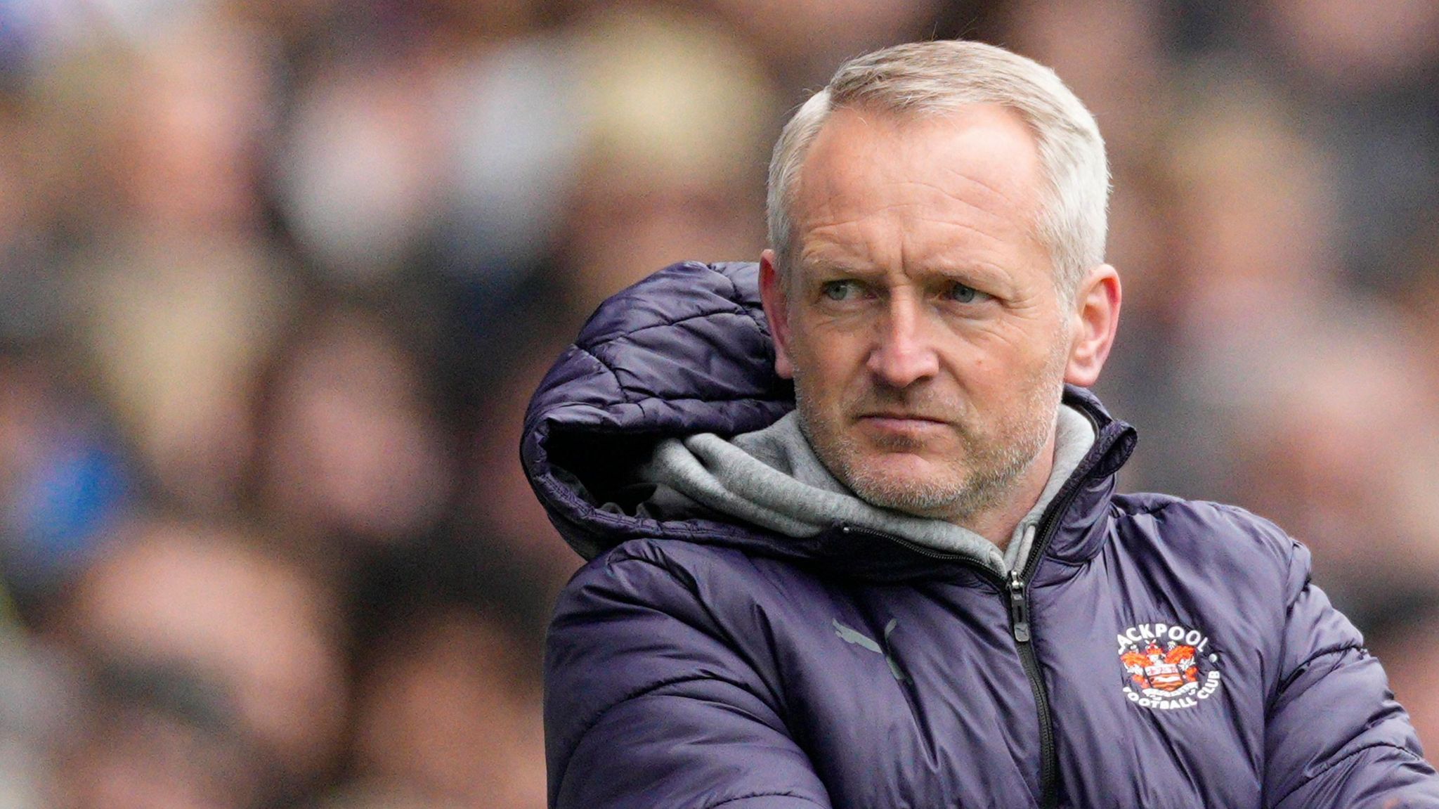 Blackpool boss Neil Critchley looks on