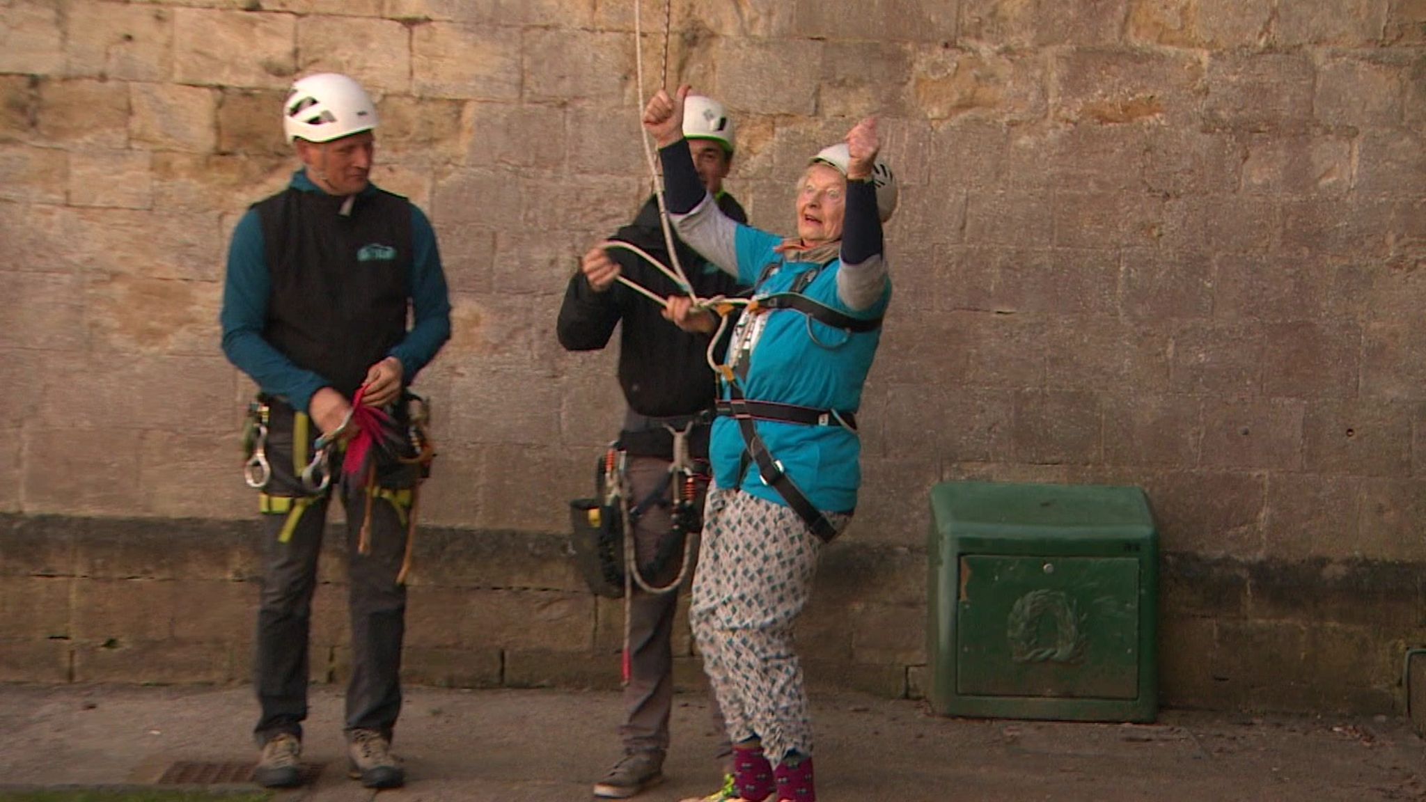 Anne Eyre abseiling down Exeter Cathedral