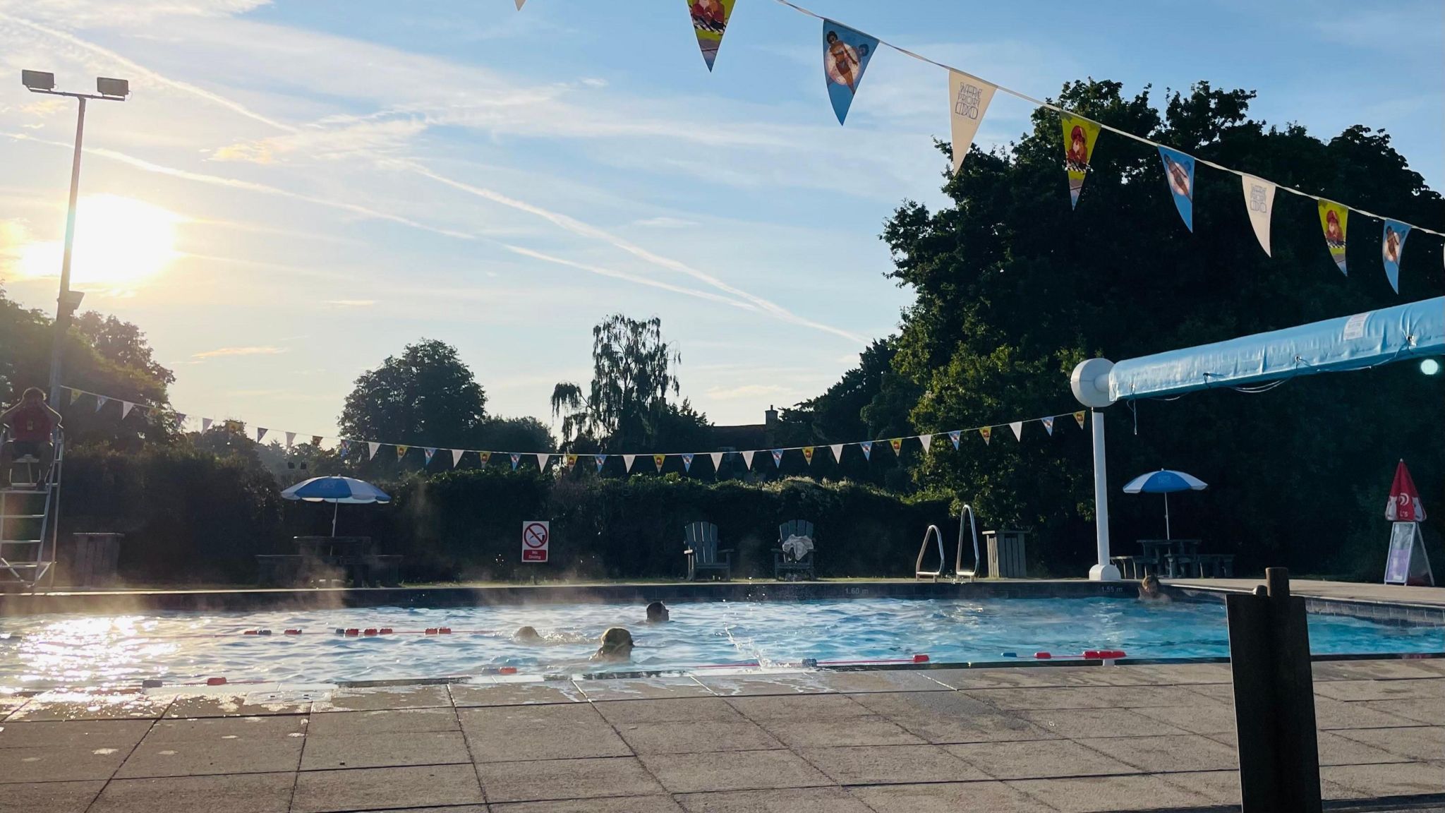 People swimming at Ware Priory Lido