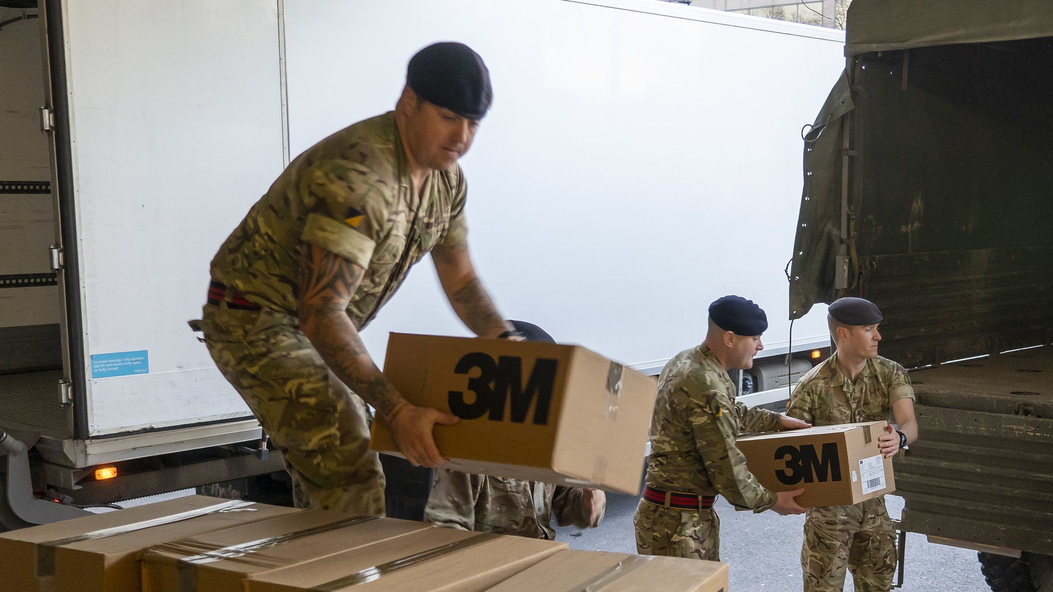 Soldiers with boxes