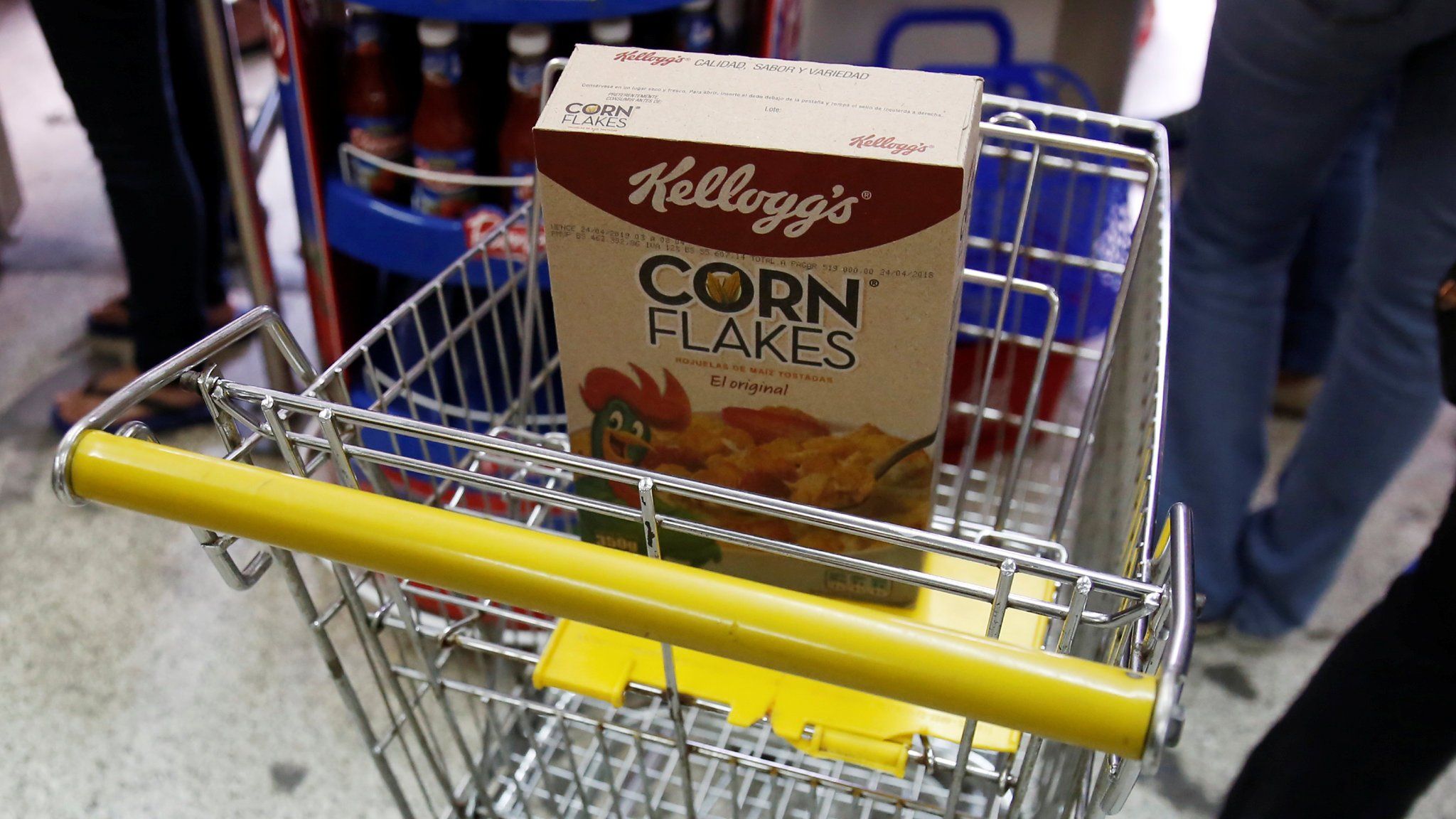 A box of Kellogg's Corn Flakes on a shopping trolley inside a shop in Caracas, Venezuela May 15, 2018