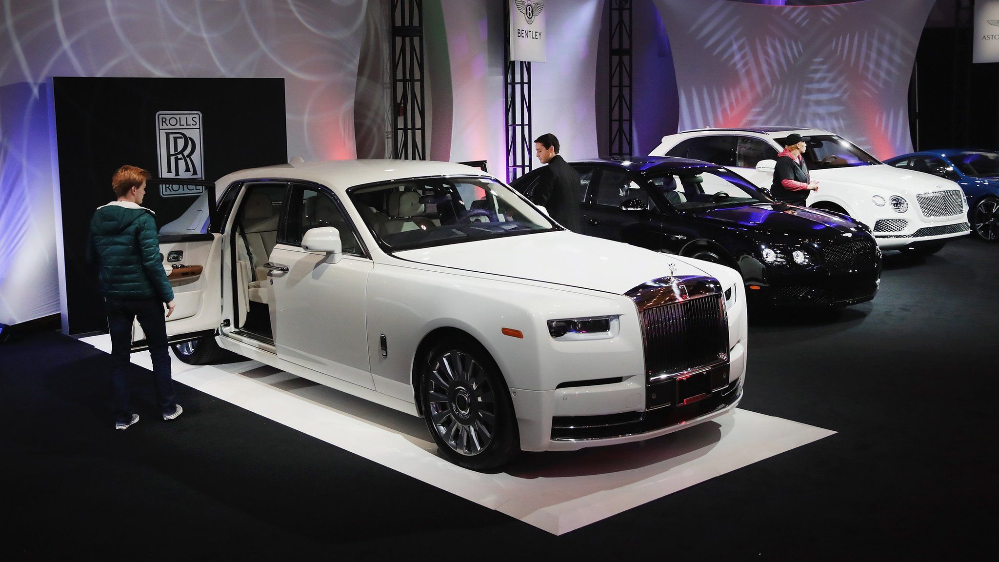 Rolls-Royce (L) and Bentley show off their new cars at the North American International Auto Show (NAIAS) on January 14, 2018 in Detroit, Michigan. The show is open to the public from January 20-28