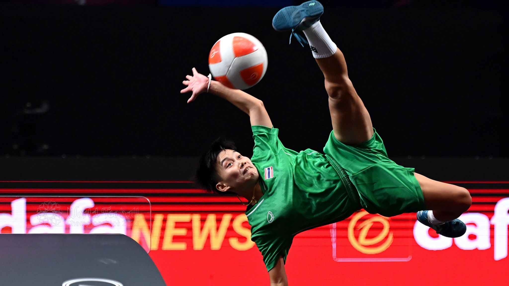 Jutatip Kuntatong executes an acrobatic overhead kick