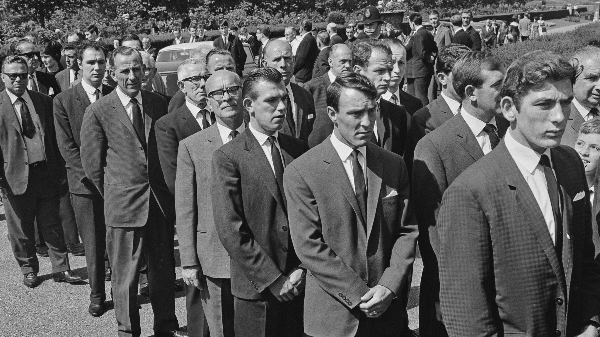 Tottenham players attend the funeral of John White